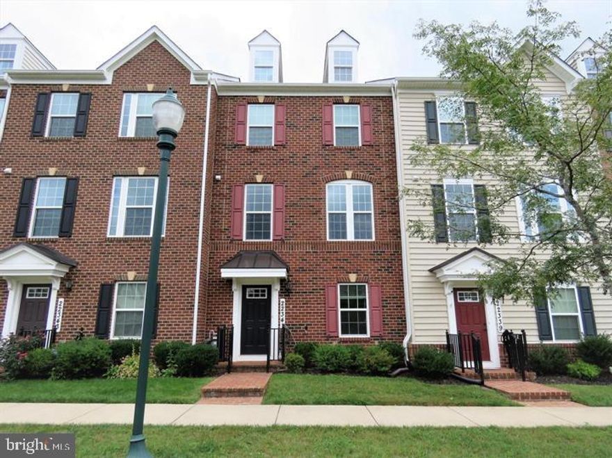 For rent! Beautiful brick-front townhome available for immediate move-in in the sought-after Clarksburg Village community. This spacious 4-bedroom, 3.5-bath home with a 2-car garage features an open floor plan filled with natural light and numerous upgrades throughout. The gourmet kitchen includes 42” cabinets, granite countertops, stainless steel appliances, a large center island, modern backsplash, and opens to the dining and living areas with direct access to a private deck. The entry level offers a flexible 4th bedroom or home office with an en-suite full bath. Upstairs, the owner’s suite boasts a walk-in closet and a luxurious bathroom with a soaking tub, double vanity, and granite countertops. Two additional bedrooms, a full hall bath, and a laundry room complete the upper level. Enjoy access to top-tier amenities including a clubhouse, pool, playgrounds, parks, tot lots, and scenic trails. Conveniently located near I-270, ICC-200, MARC train, and public transit, and close to Milestone Shopping Center, Clarksburg Village Center, and Clarksburg Premium Outlets.