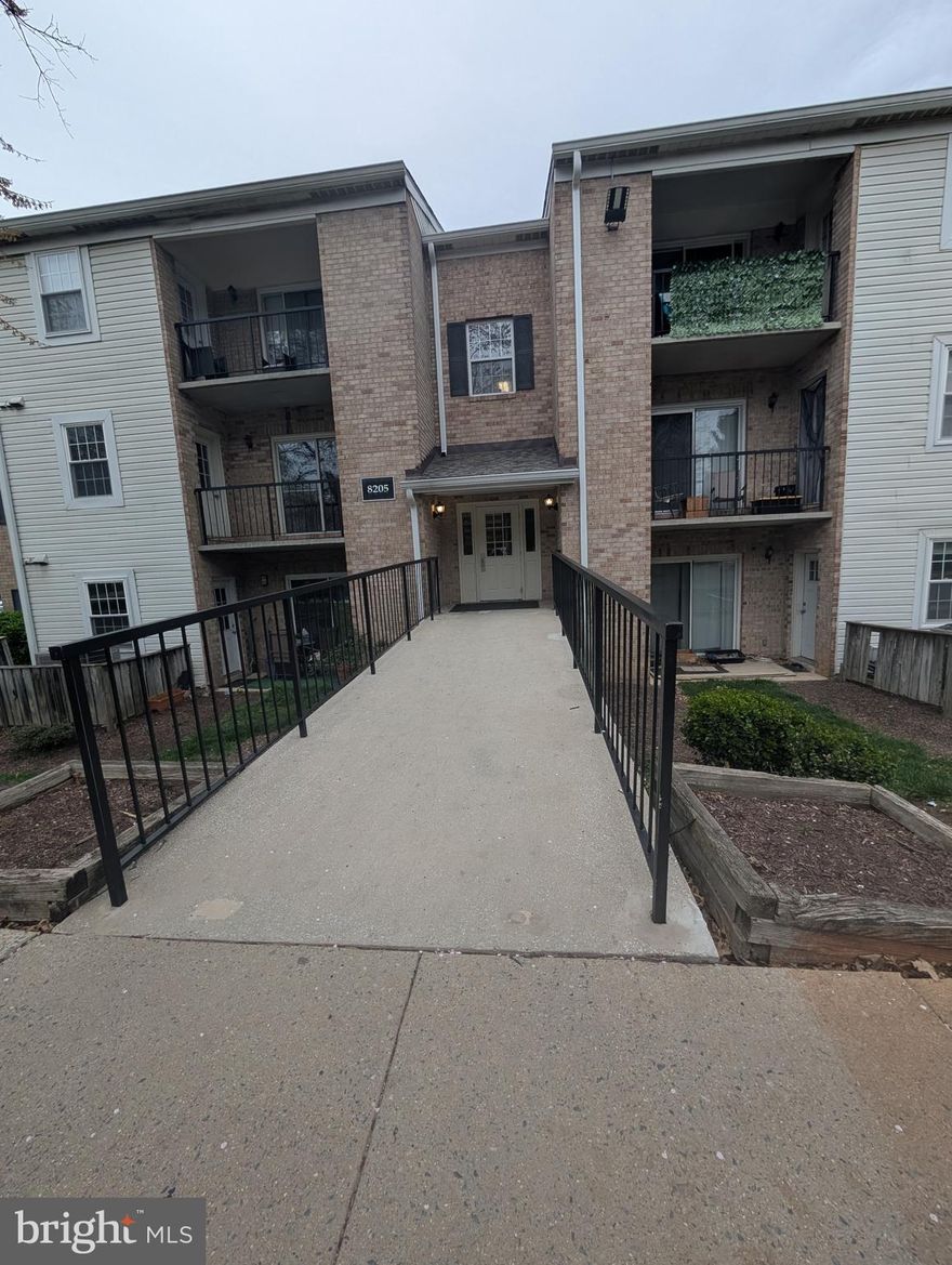 Spacious ground level unit, only a few steps from entrance, private patio area. Like new stainless-steel appliances, upgraded heat pump. Large living and dining areas, butler's pantry. Hardwood floors in common areas, like new carpet in bedrooms. Master bedroom with walk in closet, second bedroom has private outside entrance in rear. Walking distance to shops, stores, restaurants. Minutes to metro stop and major highways. Freshly painted and ready!