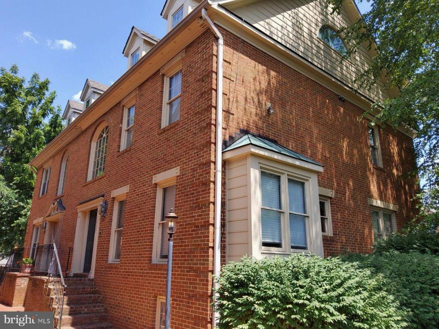 Luxury living awaits you in this stunning brick 4 level townhome with elevator, located in the heart of McLean. Built by Fred Lilly, the former model home boasts exquisite craftsmanship, luxurious hardwood floors, and elegant touches throughout.

The spacious four-level light filled home includes four bedrooms, four and a half bathrooms, and two cozy fireplaces, one wood-burning and the other gas. There's even an elevator for access to all four levels. You also get a great location: within walking distance of shopping, restaurants, grocery stores, and other amenities.

Commute to downtown DC and all major airports with ease. The Metro station is just a mile away. There's also a large parking lot with two assigned parking spaces, A & E.

This home is conveniently located, luxurious, and has exceptional features.