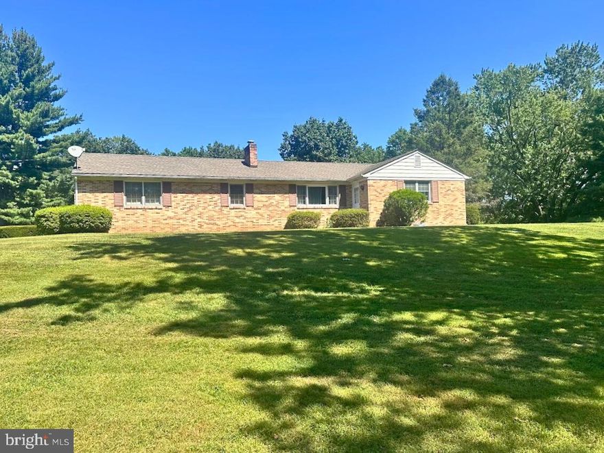 Short-Term Rental Opportunity! Waiting for your new home to be ready or searching for the perfect place to buy? This charming all-brick ranch is the ideal temporary retreat. Set on over 3.5 wooded acres in a peaceful Harleysville location, it offers a rare combination of comfort, convenience, and natural beauty. Inside, you’ll find 3 bedrooms, 1 bath and a sun-filled family room with a cozy fireplace.  An attached two-car garage provides added convenience. With easy access to PA Routes 63 and 113, this home is close to local favorites like Lederach and Mainland Golf Courses, scenic walking trails, Skippack Village and more.  Enjoy the privacy and serenity of a rural setting while remaining close to shops, dining, and major commuter routes—making this the perfect place to feel at home while you’re between homes.