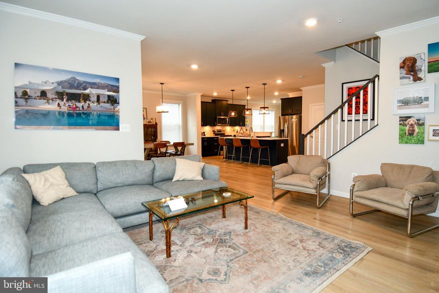 Welcome to this newly built (2022) 4-bedroom, 2.5-bath home with an open floorplan,  situated on a fenced corner lot just one mile from downtown Frederick. Located in a charming neighborhood surrounded by miles of walking paths, local coffee shops, and restaurants, this home blends convenience with community charm.

Inside this home , enjoy luxurious upgrades throughout, including crown molding on the main level, luxury vinyl plank flooring throughout (no carpet), quartz countertops, gas cooking, a modern and chic primary suite upstairs. Front porch and rear patio provide ideal outdoor living and entertaining spaces.

The unfinished basement offers excellent future potential with rough-ins for an additional bathroom and ample space for a home gym, entertainment area, or playroom. Conveniently located within two miles of grocery stores and shopping, and just  minutes to I-15 and I-70, this home delivers comfort, style, and accessibility in one exceptional package.