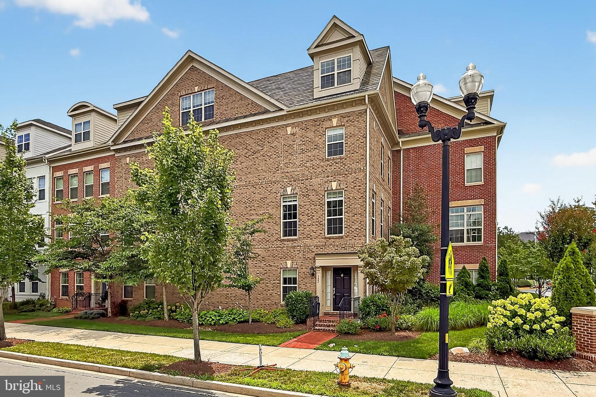 This luxurious 5-bedroom, 4.5-bathroom townhouse is ideally sited in a private enclave of luxurious homes, offering over 3,600 square feet of elegant living space in this Chelsea model across four light-filled finished levels, featuring high-end finishes throughout.
The home showcases a spacious open floor plan with 5" Oak Plank hardwood floors, a gourmet kitchen with an expansive center island and breakfast bar, and a separate dining room with access to a private deck. The main living area includes a family room with a gas fireplace, with bright recessed lighting while the entry level offers a private office and a guest bedroom with a full bath—ideal for flexible living arrangements. The third floor includes a primary suite which features a spa-inspired bath, extra-large walk-in closet, complemented by two additional spacious bedrooms, linen closet, a full bath, and a laundry closet with energy-efficient full-size LG washer and dryer. The fourth level includes a guest suite, an additional family room which can also become an efficient home office space, and access to a rooftop deck large enough for patio furniture and sun umbrella—perfect for entertaining and relaxing. Recent updates include a new, energy-efficient HVAC system (installed November 2023), new ecobee smart thermostat, a new 80-gallon electric water heater, new carpeting throughout the home, and a balcony deck upgraded with Trex planks. Additional features include a heated two-car garage pre wired connection for an electric (EV) charger, a Guardian home security system, and full pre-wiring with Verizon Fios access. Freshly painted throughout. This house is strategically located in the heart of Ballston within blocks from Ballston Metro, Ballston Mall and restaurants along Wilson Boulevard.
The house has a superb access to community living with Henry Wide Park, Lubber Run Community Center, Park and Amphitheater and the Lubber Run and Ballston Farmer's Markets which will give you and your family access to parks, nature and community. It is also a few blocks from NFATC and has easy access to Route 50, I-66 and DCA making it a convenient place to be based and connect with DC and surrounding area.
This home combines modern comfort, premium finishes, and unbeatable convenience in one of Arlington’s most sought-after neighborhoods.