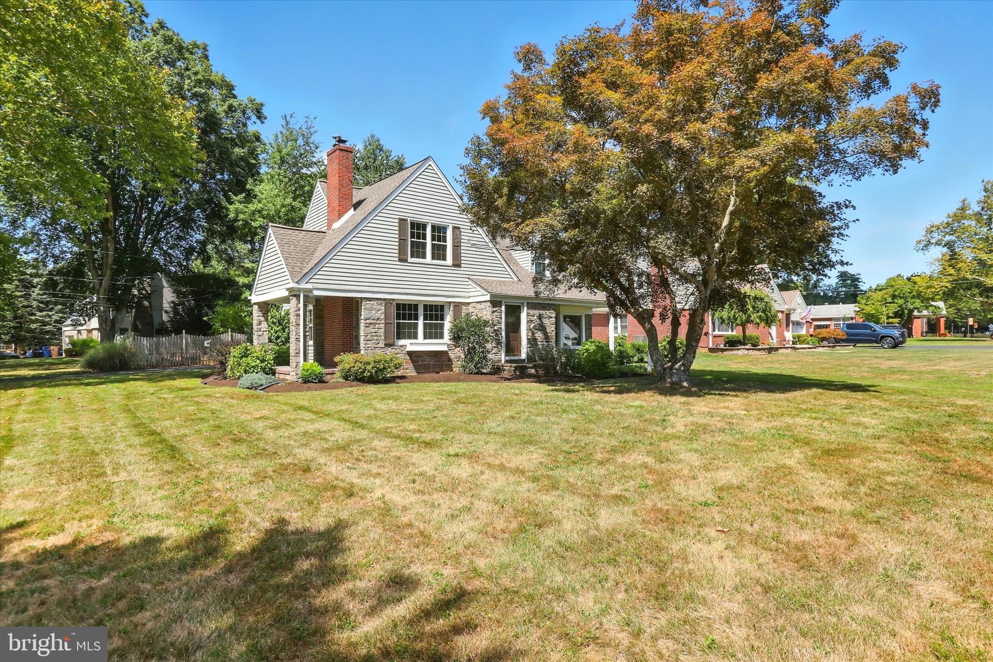 What does a 1940 built home bring you? Quality and solid construction that exudes character from every room. The sun-filled home shines thru replaced windows and all day long. Enjoy the flow from Living Room, Dining Room, Kitchen and Family Room with new engineered wood floors over original oak floors. The Living room boasts a brick surround wood-burning fireplace and custom mantel and exit door to the glorious side porch that can be converted to a three season room should buyers wish. The Kitchen is updated with white cabinets, white appliances and brand new stove. A powder room is by the rear entrance of the home for easy access from gardening or playing in the yard. Upstairs find three generous sized rooms with character curves and so much natural light. All share a full hall bath and lots of closet space. Full basement with laundry facility can be, again, converted to more space or great home gym area. The detached two car garage has a bonus room that is heated and has electric to be a home office that you can separate yourself from home and work. Outside is 1/3 acre of land. The driveway enters off N. Homestead for easy and safe access into the wonderful neighborhood of Makefield Manor. A true beauty!