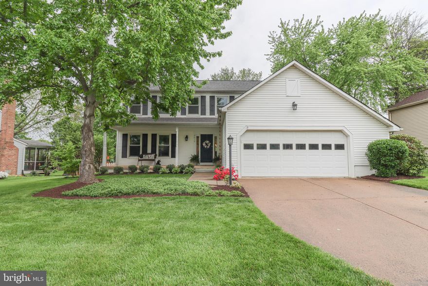 Beautiful Hamilton Model with Five Bedrooms Upstairs! Located on a quiet street with a beautiful 1/4 acre, fenced-in, level lot! A charming full length front porch! Hardwood flooring throughout most of main level. Formal living room (can be used as a separate office) and dining room.  Kitchen features granite counters and is open to the Family Room - a great open concept main level. Family room also has a wood burning fireplace, and access to the beautiful screened in porch where you will be certain to spend most of your time!  Upstairs has FIVE bedrooms  - the fifth bedroom has hall access and a door to the master (so can be an office, nursery or smaller bedroom). The basement is unfinished with walk up stairs that access the backyard.  Ready for your design!