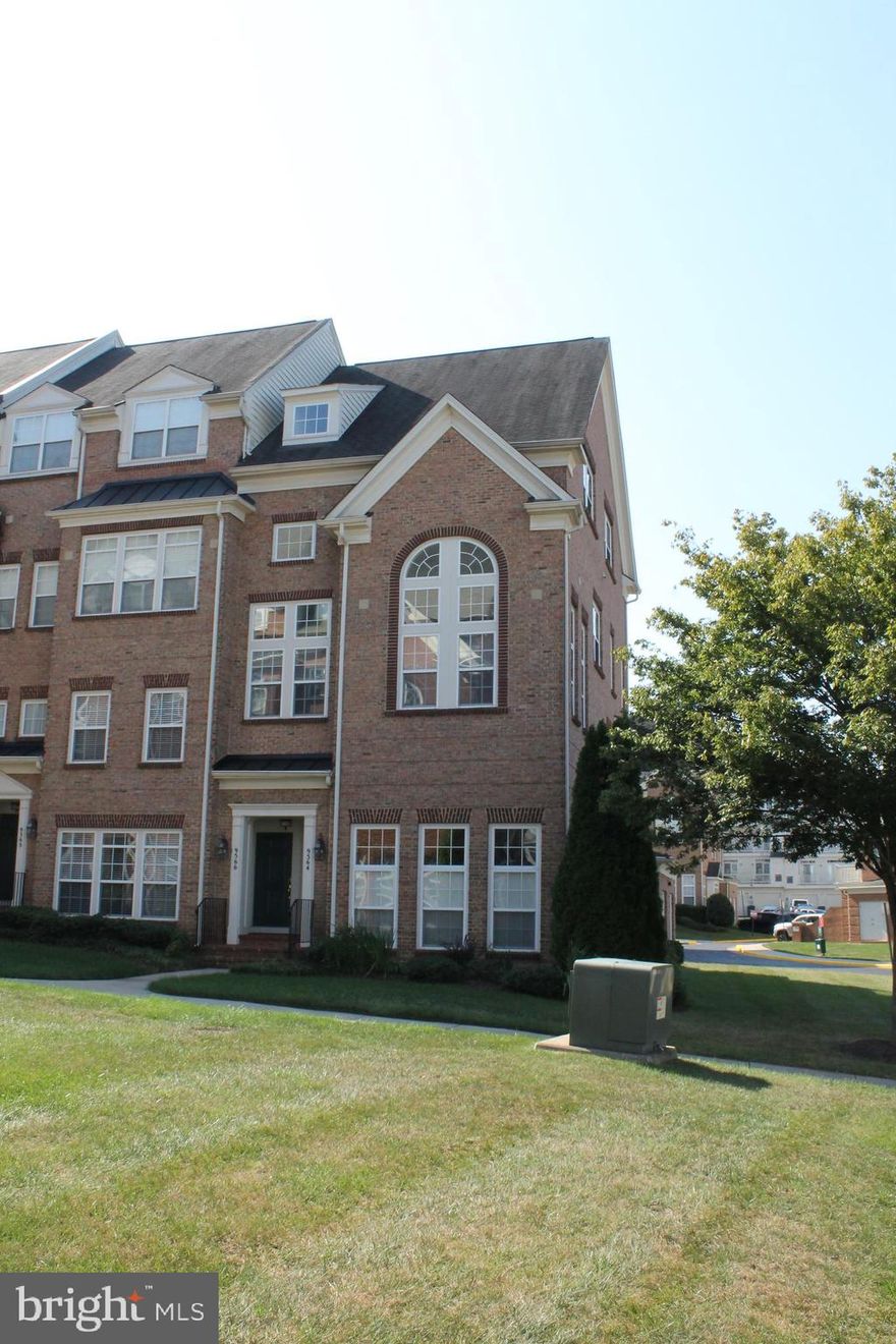 Beautiful and Bright 2 bedroom & 2.5 bathroom condo located in Manassas Park Station! End unit with open floor! Hardwood floors throughout the house, Granite tops, recessed lighting, built-in microwave, gas cooktop, and double wall oven. Large open living area with lots of natural light. Master bedroom suite includes double vanities, separate stall shower, and soaking tub. Second bedroom and full bathroom round out the upper level. One car garage and minutes from VRE!