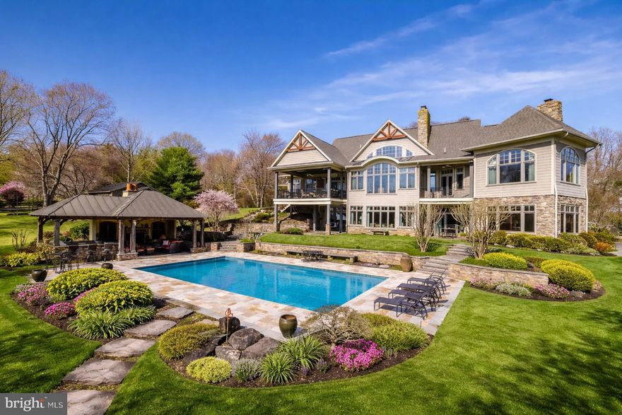 Spectacular 5 acre estate in the heart of Great Falls perched on a hill overlooking expansive grounds with pool, pool house, run-in shed, and multiple areas to entertain Never before on market.

A truly intentional residence where craftsmanship, scale, and detail define every space. Constructed with Canadian hemlock timbers, the home features hand-crafted woodwork, custom iron detailing, and thoughtfully designed living areas for both everyday life and entertaining. The dramatic entry and wall of windows set the tone, leading to a great room anchored by an Italian fireplace. The kitchen was expanded with bespoke cabinetry and Taj Mahal quartzite, creating a space as functional as it is beautiful. Every element—from the sunroom’s textured walls to the carefully selected fixtures and finishes—was chosen and executed with deliberate care, reflecting a home built with purpose and precision.