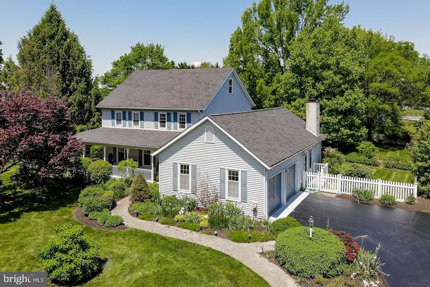 Picturesque and perfectly situated on a gorgeous lot, this well-appointed 4BR 3.5 bath home has so much to offer! You are welcomed into the home along a meandering pathway of flowering landscape to an inviting wrap-around porch.  The generous foyer with open staircase leads through paned double doors to the large formal living room and dining room, or to the open concept kitchen/family room in the back of the home.  The eat-in kitchen has plenty of 42 cabinets with under cabinet lighting, granite island, desk area, stainless steel appliances (Bosch dishwasher, LG French door refrigerator, GE 5 burner gas range with dbl oven, microwave), 2 large pantry, dbl sink, recessed lighting, and flows easily into the family room with dramatic vaulted ceiling, gas fireplace and sliding door to the deck and private backyard.  The laundry room is conveniently located on the first floor with access to the driveway, utility sink, and cabinets.  The powder room has been beautifully remodeled, easily accessible from the foyer.  On the second floor, there are 3 bedrooms and 2 full baths.   The master bedroom suite has generous space with large closet, and a gorgeously remodeled full en suite bath featuring soaking tub, tiled stall shower, double vanity, linen closet, and wainscoting.   There are 2 generously sized bedrooms, a newly remodeled full bath, and a large loft area perfect for additional lounge space.  On the third level there is a 4th bedroom with full bath that could also be a 2nd master suite, studio or office!  The 2-car garage has interior access and garage door openers.  The back yard is the perfect place to relax, with privacy, lush landscape, large deck with pergola and hot tub for entertaining, and fenced yard.  New Roof 2018 and recent upgrades to HVAC and hot water heater.  This home offers much value in amenities at this price, all in award winning Avon Grove school district and within close proximity to DE, Chisel Creek golf course, and commuter routes.  This home is sure to please - make your appointment today!