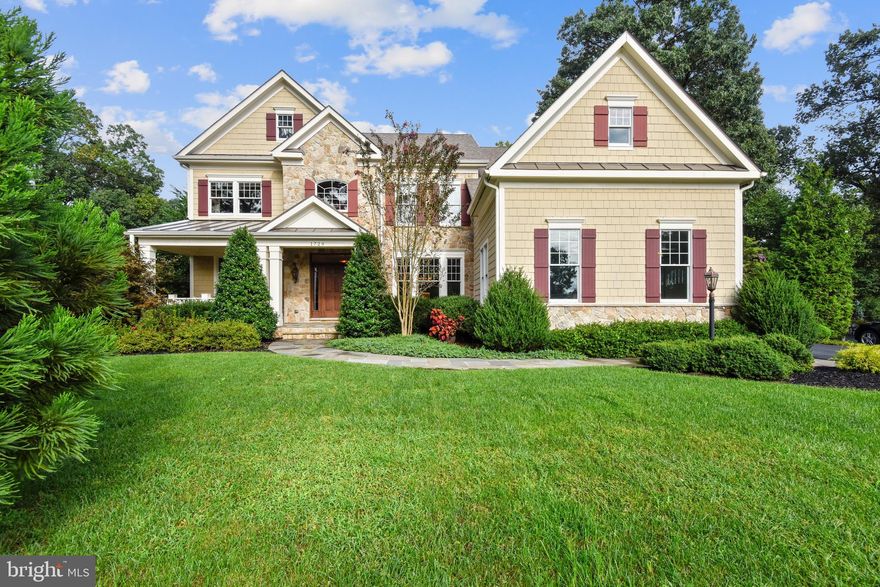 Spectacular Sekas built home is smartly designed with today's lifestyle in mind, and features four fabulous levels and more than 6500 square feet of living space, plus an oversized 3 car garage and a cozy front porch!  Beautifully sited on a .71 acre private, landscaped lot, this gracious home has everything that you have always dreamed of in a custom built residence.  From the moment you enter this lovely home, you will be captivated by the warm and inviting interior that is perfect for multi-generational living with 5 generous sized bedrooms on the upper levels, and a lower level 6th bedroom suite.    The gourmet kitchen with granite island and upgraded appliances is a chef's dream, and the great room with stone fireplace is the heart of the home and a relaxing spot for fireside chats .  The spacious living room and dining room are perfect for large holiday gatherings, and the main level library offers an ideal space for working from home.  The expansive fully finished lower level offers a rec room with stone fireplace, an in-law or au pair suite, and a multitude of options with  a huge bonus/flex space that can be used as a second office, home schooling center or gym.  The beauty of this home extends from the inside out with beautiful views and natural light throughout. The  3/4 acre lot provides a large flat backyard with plenty of space for a pool, and the landscaped front yard and porch add to the curb appeal.  Built in 2010,  this Covington model features high quality materials with a Hardiplank and stone exterior, Anderson windows, Carrier HVAC units, hardwood floors, crown molding, and a high quality architectural shingle roof.   The location is superb - minutes from Tysons Corner, the Silver Line Metro, Wolftrap and major commuter routes.  Award winning school pyramid - Westbriar Elementary, Kilmer Middle, Madison HS.  Virtual Tour:  https://mls.truplace.com/property/116/91089/.