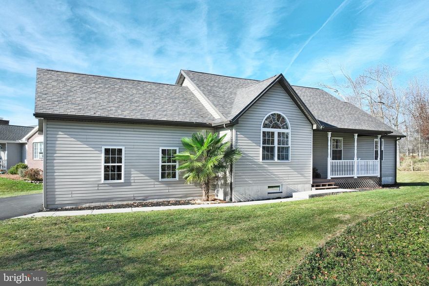 Stunning Ranch-Style Home in Beautiful Lake Meade – Ideal One-Floor Living with a Lake View!

Welcome to this beautifully remodeled rancher, offering the perfect blend of comfort, style, and convenience. Enjoy the serenity of lake views from your front yard and the peaceful backdrop of open fields from your rear yard. Located directly across from the Shorewood Recreation Area and boat docks, you’ll have quick access to a variety of outdoor activities.

Step inside to discover a bright and airy open floor plan featuring cathedral ceilings and elegant Palladian windows that flood the space with natural light. The thoughtfully designed layout includes a spacious primary bedroom with a walk-in closet and a full ensuite bath for ultimate privacy and comfort. For added convenience, the laundry is located on the main floor.

The fully finished garage is a standout feature, complete with recessed lighting, abundant cabinetry, and stunning hickory countertops for optimal organization and additional storage. 

Completely remodeled in 2021, this home reflects exceptional attention to detail. Key updates include a brand-new roof, fascia, soffit, and gutters, along with beautiful rattan maple hardwood flooring and recessed dimmable lighting throughout. The kitchen is equipped with top-of-the-line stainless steel appliances, Brazilian granite countertops, a ledgestone backsplash, and a custom coffee bar.

Stay comfortable year-round with a brand new 18 SEER CAC and heat pump (installed August 2024) and additionally equipped with a high-efficiency 92% propane gas furnace. For extra storage and potential, there is easy stair access to a large attic and a full basement.

With a perfect blend of modern updates, thoughtful design, and a prime location, this home is an exceptional find in the Lake Meade area. Don't miss the opportunity to make it yours!