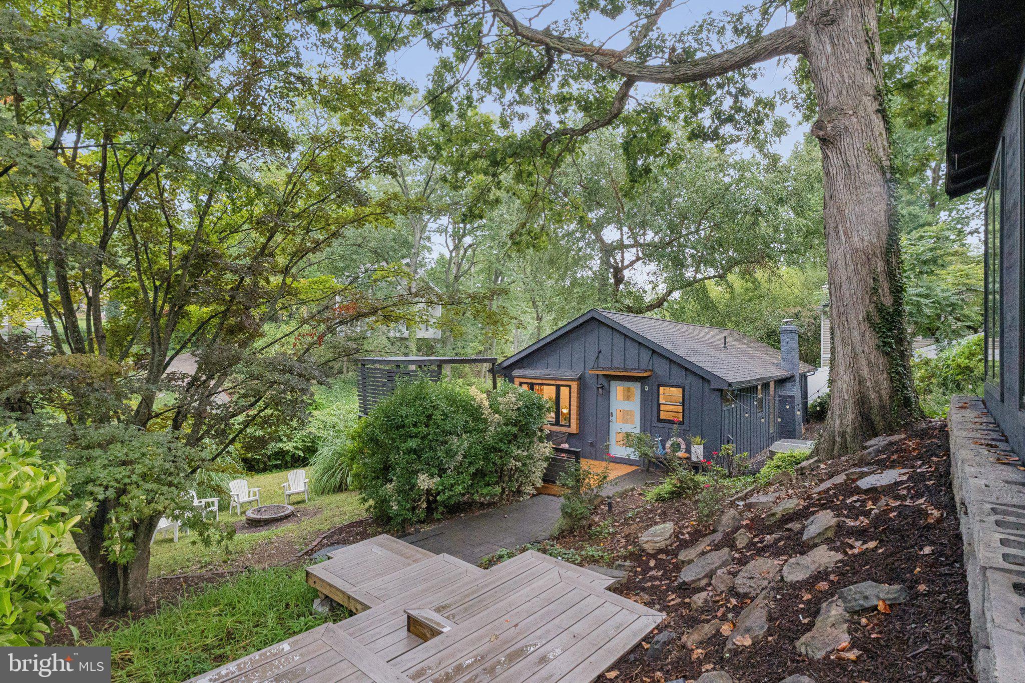 Stunningly renovated coastal cottage in Edgewater’s best water privileged community. This unique property, hidden from the street, offers a 2br/ 1ba main house and an additional 1br/1ba guest house. Inside the home you’ll fine a designer kitchen, floor to ceiling windows, updated bathroom with large shower, and many other charming details. Experience water views of Spring Lake from the back deck and enjoy the beautiful mature landscape. The home features an oversized 2 car garage with new concrete slab. In the last 5 years the homeowner has replaced all appliances, hot water heater, well pump and expansion tank, windows, siding, and installed an energy efficient mini-split HVAC system. Edgewater Beach amenities include a beach pavilion, pier with boat slips, boat launch, kayak racks, and much more.
This is a properly not to miss!