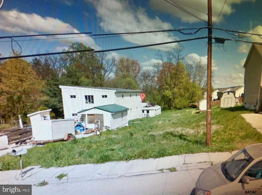Perfect lot w/ water and sewer tap fees paid and ready to go. Mobile homes ok.