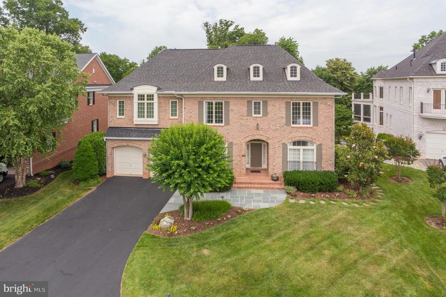 Extraordinary home offering magnificent golf course & river views, sited on the signature 15 hole! Gracious living over 3 finished, light filled levels.High ceilings,grand Master Bedroom suite w/ sitting area & private balcony. 2nd level loft. Main level bedroom w/en-suite BA, and formal family room offering deck access and amazing views! Expansive LL w/entertaining area and patio! Gated Community