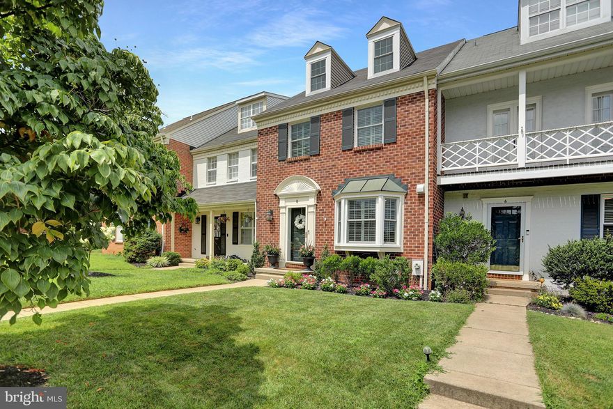 Well maintained LOFT townhouse with 3 bedrooms, 3 1/2 baths in sought after MAYS CHAPEL VILLAGE.  
Walk in entry with hardwood floors, powder room and hall closet.  Updated kitchen with granite countertops, backsplash, hardwood floors and bay window. Dining Room with chair rail and crown moulding. Nice size living room with crown moulding, slider to the oversized deck.  
Second floor features include the primary bedroom with updated bath and loft, 2  additional bedrooms and updated hall bath.  Wall to wall carpeting. 
Lower level family room with wall to wall carpeting, fireplace, dry bar and glass slider to the exterior, full bath as well as utility/laundry room and bonus storage room . 
Additional amenites include plantation shutters throughout, new HVAC (2019), new windows (2020), new Hot Water heater (2022) .   Put this one on your list to see!