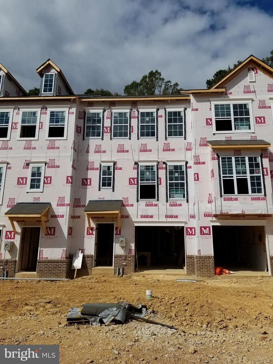 Sold & Settled Garage Townhome at Elizabeth Hills. The Olympia #1 will feature a lower level garage with finished basement, our open rear kitchen design on the 1st floor (granite & upgraded cabinets) and 3 bedrooms and a laundry area on the upper level. Hardwood on main level (minus kitchen area), 10'x12' composite deck with stairs to grade and stainless steel appliances. $12k towards closing.