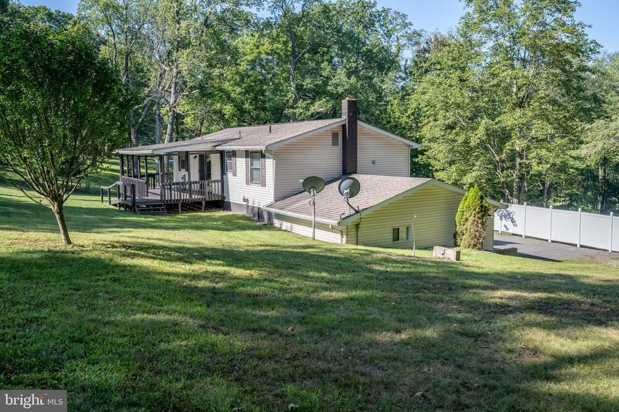 Incredible setting for this 2BR-1BA home sitting on a beautiful 1.00 acre lot on Turkey Neck Road. Sit on your back covered porch and enjoy the evening views of the surrounding farmland. Paved driveway leading to one car attached garage. Large living room with hookups for propane fireplace (no fireplace currently there). Kitchen with nice appliances and access to rear deck/porch. Full bath features tub/shower. Full unfinished basement so you can expand the amount of finished living space. This one won't last so contact your agent right away.