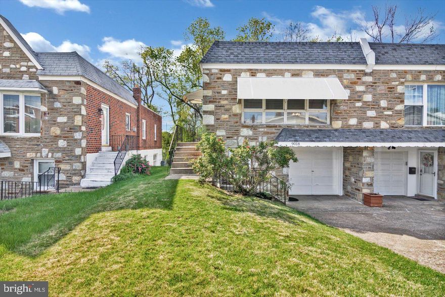 Welcome home to 9018 Cloverly Rd, a beautifully refinished home. Upon entering you come into a bright and sunny open floor living room with huge windows and views into the kitchen and dining area.  The kitchen has all stainless steel appliances, granite counters, white 42" shaker cabinets with soft close technology and a breakfast nook for extra seating.  A subway tile back splash, recessed lights, under cabinet lighting and an extra deep sink will make cooking in this kitchen a sheer pleasure. Three generously sized bedrooms are on this level and share a bathroom with Moen fixtures, ceramic tile floors and walls, new vanity and a barn door that adds charm and saves space. The lower level has a finished family room with Pella slider doors to the fenced in back yard with tree views (Pennypack Park) for privacy.  There are two closets for storage in addition to a powder room.  There is an unfinished space that is clean and boasts new floors. This space is for storage, laundry and has an access door to the outside and garage.  The square footage including the finished and unfinished space on the lower level is over 1000.  The one car garage allows for even more storage.  This home has many more features: new luxury vinyl plank flooring throughout the entire house (there are hard wood floors under the plank flooring on the upper floor only), new multi zone mini split AC system with 3 active zones,  fresh paint,  new front entry and lower level doors with new lighting and so much more.  Call today to see this beauty!