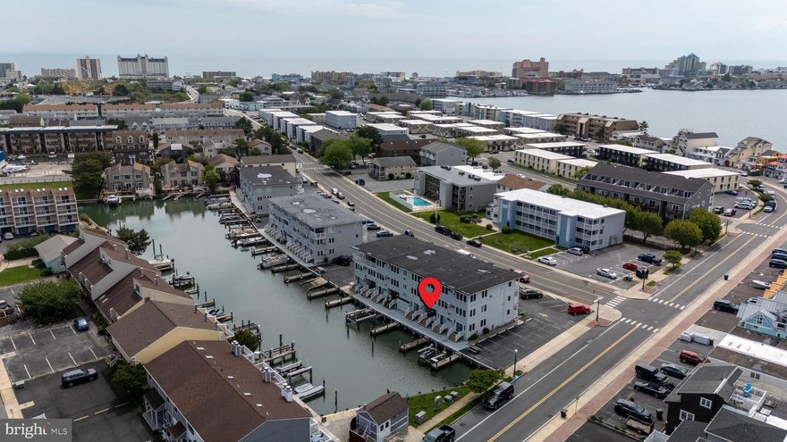 Turn-key canal-front 1BR/1BA condo in a prime OCMD location off 28th Street! This upgraded first-floor unit features a private waterfront deck with seating, stylish coastal finishes, and a convenient coffee bar. Summer season bookings already in place—walk into immediate rental income! Close to the beach, boardwalk, dining, and entertainment. Ideal for personal use or investment!