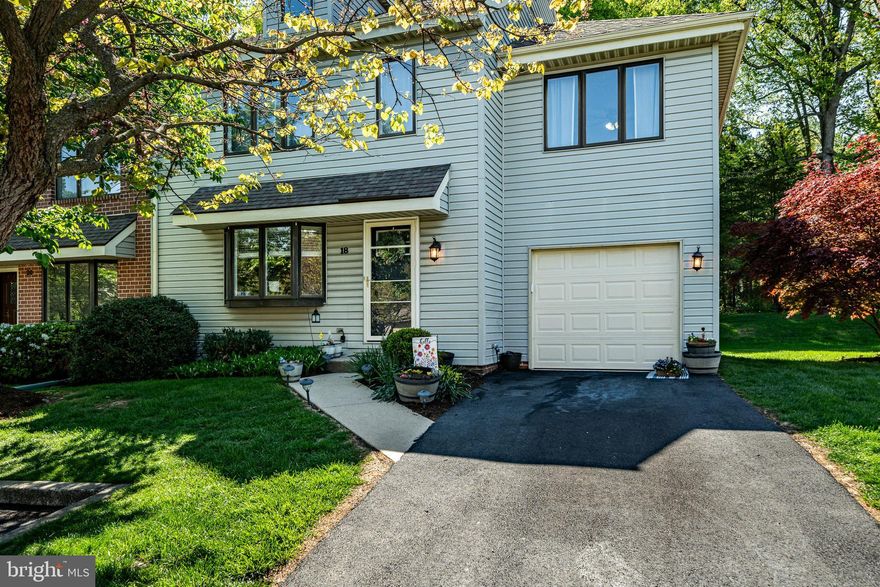 Welcome to 18 Foster — a meticulously maintained 4 bedroom, 2.5 bathroom end-unit townhome nestled in the desirable Whitford Commons community of Downingtown and located within the award-winning Downingtown Area School District. Lovingly cared for and thoughtfully updated by its current owner, this home offers the perfect blend of comfort, style, and convenience with upgrades including a remodeled hall bathroom, newer water heater, newer kitchen appliances, and newer flooring and carpeting throughout.
Step inside and immediately appreciate the beautiful flooring, neutral paint colors, and inviting atmosphere throughout the main level. To your left, the kitchen awaits, complete with stainless steel appliances and ample room for an eat-in dining area beside large windows that flood the space with natural sunlight. Continue down the hall to the dining room, featuring an open overlook into the living room below, creating a warm and airy layout perfect for both everyday living and entertaining guests. The cozy living room offers a fireplace, ceiling fan, and sliding glass door access to your private back patio. A conveniently located half bathroom completes the main level. Upstairs, the spacious primary suite is a true retreat featuring soaring vaulted ceilings with skylights, a private balcony overlooking the serene backyard, and a large ensuite bathroom with dual sinks. Two additional generously sized bedrooms, each with ample closet space, share easy access to the full hall bathroom. The second-floor laundry area adds everyday convenience. Ascend to the third-floor loft — an incredible flexible living space offering endless possibilities as a fourth bedroom, home office, playroom, media room, or additional lounge area. The fully finished basement provides even more comfortable living space, complete with cozy carpeting and versatility for recreation, fitness, or entertaining. Out back, enjoy multiple decks and patios where you can relax and unwind while taking in the peaceful wooded backdrop and secluded setting. All of this while enjoying quiet neighborhood living just minutes from local parks, shopping, dining, and major roadways for easy commuting. Schedule your showing today! ***Some photos have been virtually staged.***