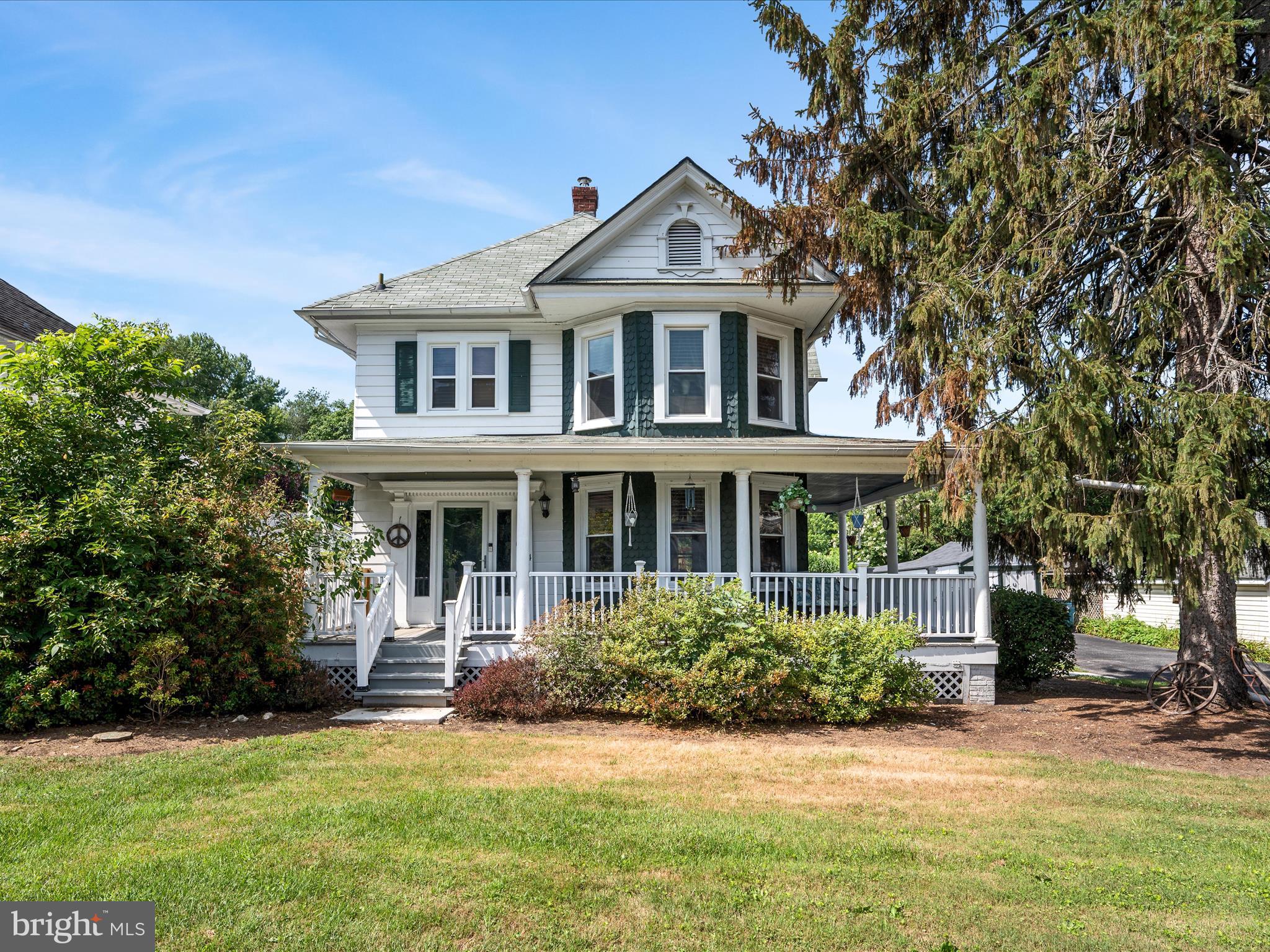 Discover vintage charm and modern convenience in this Victorian-style home on a picturesque 0.34-acre lot just outside Boonsboro, Maryland. With its signature wraparound porches, a large outdoor patio for entertaining, and a paved driveway, the property invites you to enjoy both style and function. Inside, you'll find three bedrooms—including one with private access through another—plus a full bathroom. Recent updates like a new HVAC system, water heater, sump, pressure tank, and new windows provide year-round comfort. Enjoy the beautiful gardens and the fully-fenced backyard! A versatile three-season attached workshop or sunroom, 12x28’ workshop outbuilding, and an additional storage building offer ample space for creative or practical pursuits. This one-of-a-kind property blends timeless character with everyday livability in a peaceful, convenient setting.