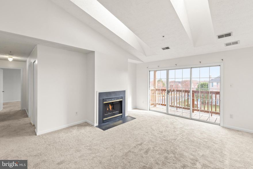 Penthouse condo in excellent condition and move in ready. The cathedral ceilings and skylights in the living room provide for a bright, cheerful space, while the gas fireplace provides a cozy feel. . Sliding glass doors to a charming balcony with some mountain views provide additional enjoyable space. The interior of the unit includes a dining area, kitchen with electric range, dishwasher, refrigerator, counter microwave and disposer, 2 bedrooms and baths and a laundry room.  The first bedroom has lovely bay window and two closets and is located off the hall across from a bath that has a combination tub/shower. The primary bedroom at the end of the hall includes a walk-in closet and an attached bath with a walk-in shower. The utility room is a separate room and includes the washer and dryer. Conveniently located just off of Route 7, close to I-81 and close to shopping and other major routes, makes this an ideal location! (pictures posted are of the unit before painting, and will be replaced once new photos post painting can be obtained)
Updates include: December 2019: new washer and dryer; plumbing replaced in 2 bathrooms, and laundry room with copper pipes; tile flooring was installed in the 2 bathrooms and laundry room; some carpet was also replaced; In 2023 New HVAC installed and a new dishwasher was installed; October of 2025,  a new electric hot water heater was installed.   (painting the week of November 5-walls will be Dover White).Gas fireplace has wall switch for gas logs.