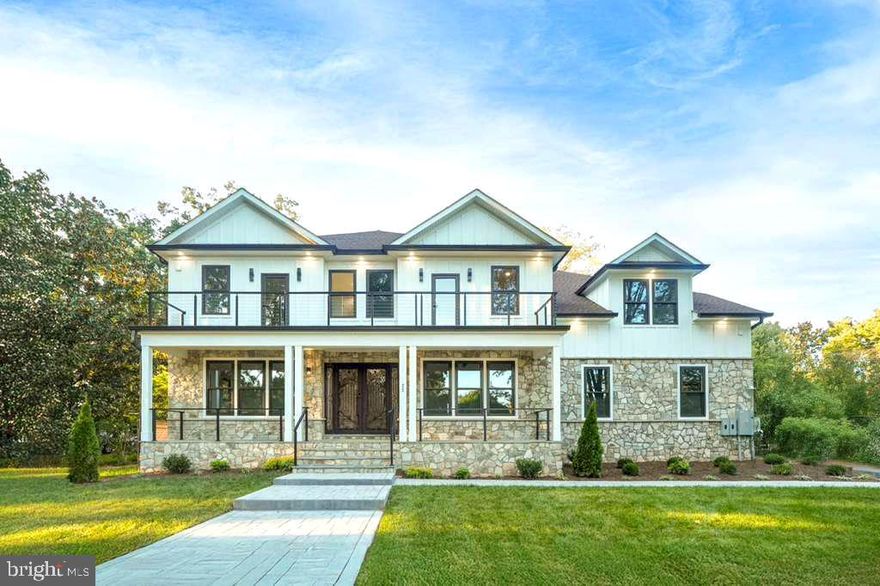 BRAND NEW CONSTRUCTION JUST FINISHED- MOTIVATED SELLER- OPEN HOUSE DECEMBER 06,  (SATURDAY) 12-2PM - Discover this exquisite modern custom build contemporary new construction home, boasting over 6100 square feet of luxury on a flat .50-acre corner lot in heart of Fairfax City.  This residence features a side-load 2-car garage and an array of elegant amenities, including a main-level en-suite bedroom/office, four bedrooms upstairs, and another on the lower level. This home has an oversized 510 sq feet garage, 215 sq feet front stone porch, 182 sq ft second level deck and features 6 bedrooms/6.5 baths, providing ample space for a comfortable and luxurious lifestyle. This luxury estate home offers an unparalleled blend of elegance and customization. Enter through the designer double front doors from the welcoming covered stone front porch and be greeted by a stunning 2-story foyer. The main floor impresses with formal living and dining rooms, a chef's gourmet kitchen equipped with high-end Thermador stainless steel appliances, a 11-foot center island with waterfall edge luxury quartz countertops and designer series maple cabinetry. The main level also includes an oversized Guest Suite with a private bath perfect for a weekend guest but designed to support full time living. Second floor owner’s Suite – Private retreat with a Boxed Ceiling, two Walk-In Closets, and a luxurious bath with quartz countertops, freestanding tub and shower. Master bathroom also has a separate morning room and loft area for owner’s convenience. Every bedroom has private En-Suit baths, with walk-in closets. Two bedrooms also have attached morning/sitting/Loft areas, perfect for a home office, playroom, or retreat. Lower Level is fully finished with a Recreation Room, Bar, Exercise Room and additional Bedroom with Full Bath. This remarkable home is equipped with dual-zone Carrier HVAC systems, a 75-gallon electric water heater, PVC exterior trim, 30-year shingles, and combination of stones and Hardie board siding, ensuring style and durability. The home's design is elegant and modern, featuring a modern transitional exterior from stone to Hardy Planks. The construction of this property is of the highest standards, including 9 ft ceilings on all levels, exquisite modern moldings with custom LED lighting, wide plank oak hardwood floors, custom porcelain tile in every bathroom, and Kohler toilets. The house also features modern handrails, black windows, LED ambient lighting, tray ceilings in the family room, custom cabinetry in every bathroom, and an EV outlet in the garage. The location offers easy access to amenities, major highways, and metro stations, providing a connected lifestyle without compromising luxury. Interested buyers are encouraged to contact the listing agent to schedule a meeting with the builder.