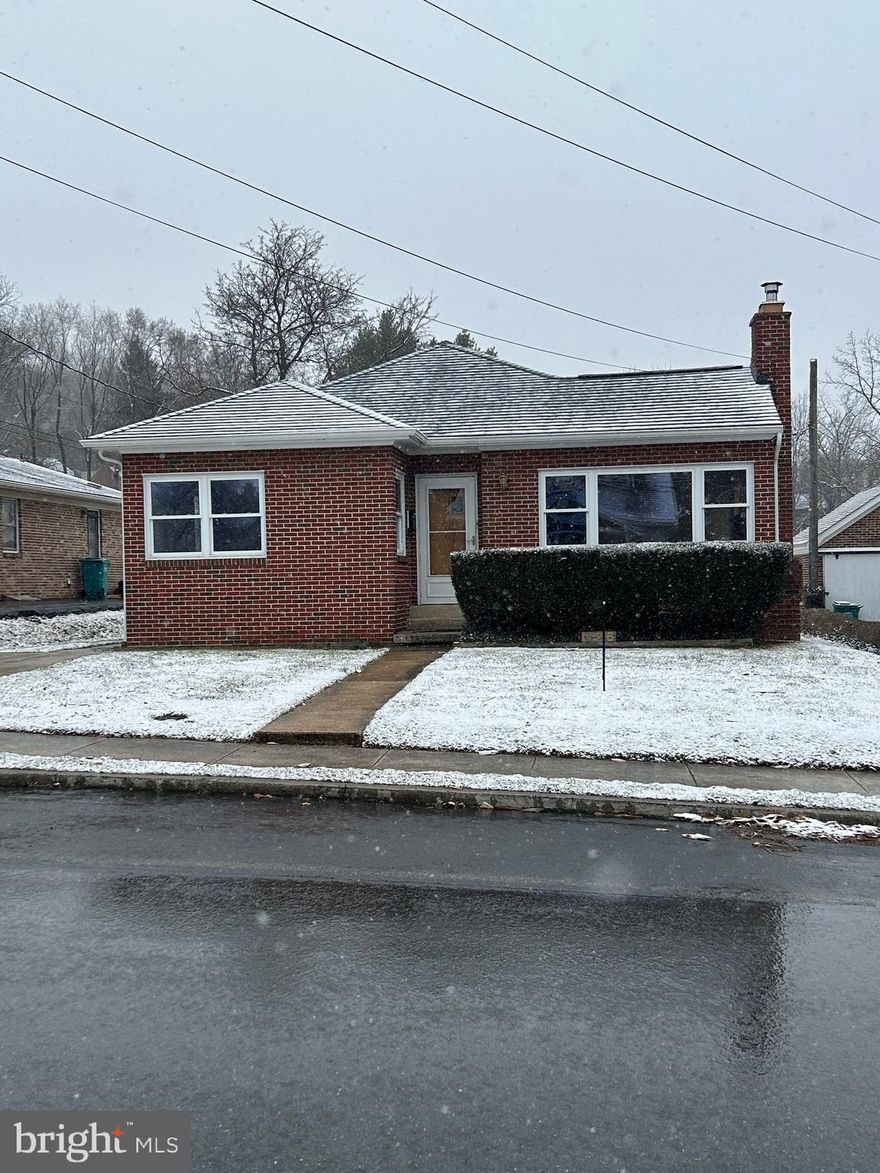 Lovingly maintained home located in central historic Boonsboro.  Two blocks from Shaffer Community park and a few miles from Greenbrier State Park.  Enjoy the small town atmosphere with easy access to Washington D.C., Frederick, and Baltimore.  All brick rancher with large bedrooms, updated bathroom, refinished wood floors, new paint and updated electric.  Move-in ready with upgraded kitchen with soft close wood cabinets, granite countertops, and newer appliances.  Plenty of storage space with partially floored attic and full basement with ample storage room, lights for shop, and secret gun room with reinforced steel door.  Permitted detached garage built with room for 4 cars and loft storage space.  Enjoy planting your own garden in prepared beds.  Seller can provide meticulous records for all updates. Save on electricity by heating the entire home with the wood burning fireplace insert.  The chimney has been fully lined for safety.  This home is move-in ready for the most discerning buyer.