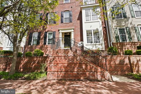 Photo of 8856 Ashgrove House Lane #102, VIENNA, VA 22182 (MLS # VAFX2302614)