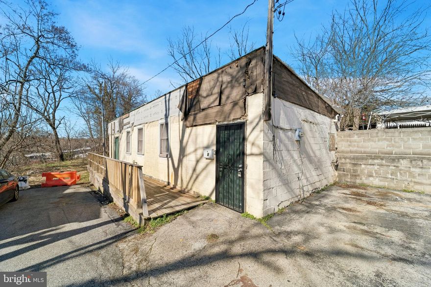 Corner property consisting of  a 2 bedroom trinity style end of row house Plus an approx 900 sq ft separate workshop/contractor space. (Formally a furniture repair shop and a contractor office/storage space. 
House was updated in 2016 and has gas heat, central air and is freshly painted. Estimated rental income for the house is $1450-1550 and for the separate contractor building, $1000 per month. NEW ROOFS ON BOTH.