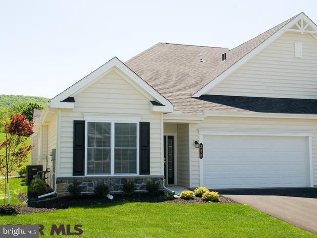 Regularly ranked the Top Active Adult Community in State College, Traditions of America at Liberty Hill Community features include: Magnificent clubhouse and lifestyle center w/concierge service, heated pool, library, cafe, media room, whirlpool, fitness & aerobic rooms, massage and wellness rooms, walking trails, bike paths, mountain views and more! If you choose to build the 3BED/3BATH Adams II, it offers an open floor plan, 2nd floor w/ 3rd bedroom, bath and loft area. Photos are of models, upgrades add to pricing. Distinctive features in all models include: 9' ceilings, Energy Efficient Comfort Plus Program, Six-panel doors, 36 kitchen cabinets w/crown moulding, designer kitchen and bathroom options, patio or deck, storage area above garage. Customize w/multiple options!