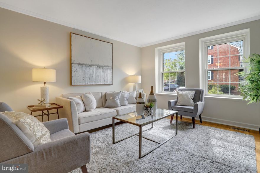 Welcome to Fairlington Villages elusive *Hermitage  model*, a two-level, end unit home. Discover the perfect blend of charm and modern updates in this beautifully renovated home, offering 1,528 square feet of finished living space. The main level features a spacious living and dining area, highlighted by original hardwood floors and abundant natural light pouring in through numerous windows. The updated kitchen, alongside a large bedroom with ample storage and a full renovated bathroom, creates a comfortable and inviting space. The lower level expands your living options with a versatile recreation room, a generously sized den, a fully renovated bathroom, and a dedicated utility/laundry room. As an end-unit, this home boasts a spacious backyard with open views—perfect for grilling, entertaining, or simply unwinding in your own private retreat. The unit provides two dedicated parking spaces and an additional unit entrance at the lower level for convenience and privacy. Fairlington Villages offers an array of fantastic amenities/services, including shuttle service to the metro, six swimming pools, tennis courts, playgrounds, walking trails. Ideally situated near I-395, this community provides easy access to the vibrant shopping and dining scenes of The Village at Shirlington, West Alex, Bailey’s Crossroads, Del Ray, and historic Old Town Alexandria. Don’t miss the opportunity to own this move-in-ready home.