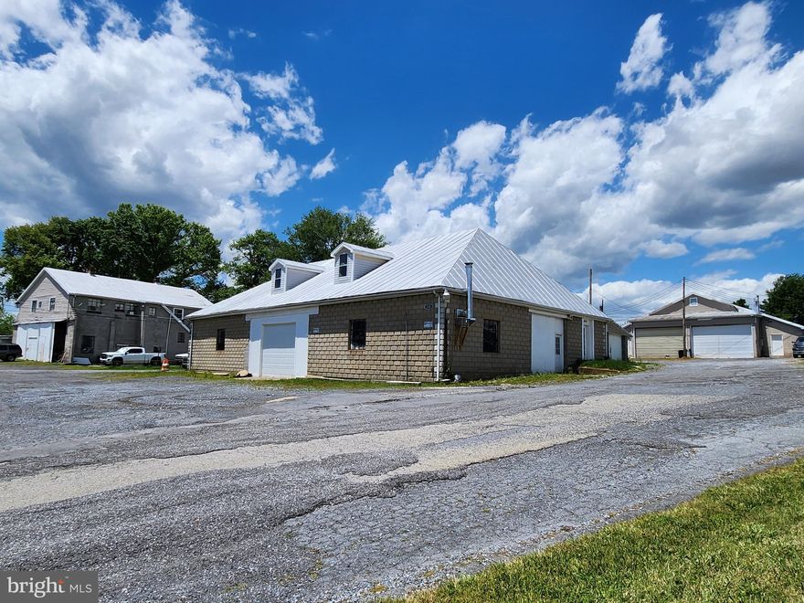 MIXED USE/COMMERCIAL PROPERTY IN FREDERICK COUNTY TAX ID's 12-287232, 12-287240
This 4.36+/- acres on two parcels  consist of improved and unimproved land.  Currently this income producing property is being used for commercial and residential use. TENANTS ARE PAYING MONTH TO MONTH. 
 This is an Owner/Occupiers dream come true. All buildings including trailers and house could be used as commercial use. Currently trailers and house used as apartment units as well as two units in one of the buildings (top floor).  Rear building has car lifts that can be negotiated. 
The two parcels both have separate wells and both have separate water treatment systems. 
+/-385 ft. of road frontage easy access in and out,  about  a half mile west of RT 340   
PLEASE  SEE DOCUMENTS FOR ADDITIONAL INFORMATION.