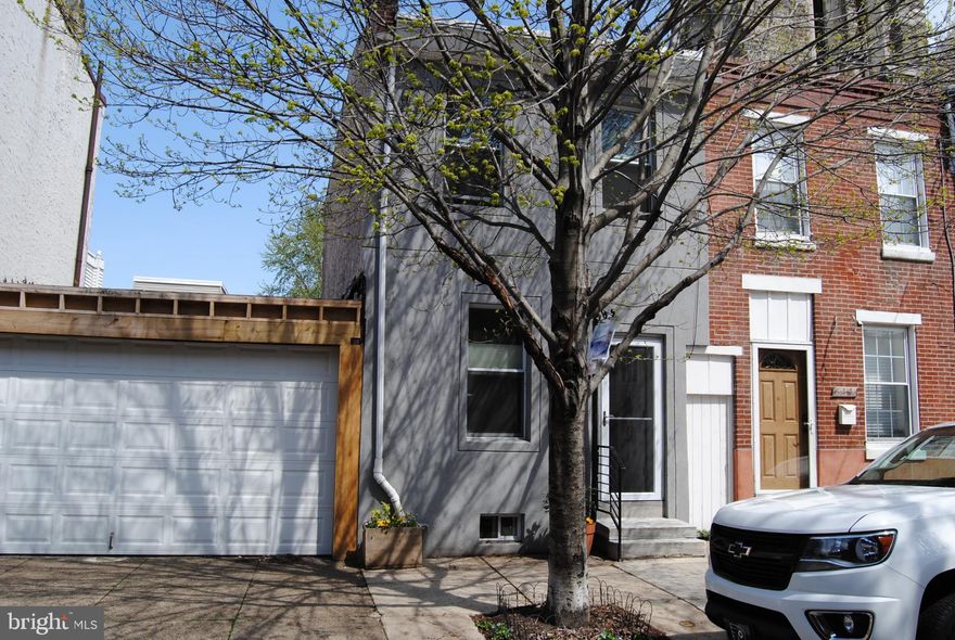 Prime , prime Fishtown block !! Modern front , formal  living room with newer hardwood  flooring .Beautiful gourmet kitchen with granite counter top , large counter eating area , newer stainless steel appliances including dishwasher, microwave,gas  range , stainless steel sink ,and rear open eating area , Exit slider door  to rear maintaince free private fenced yard with butterly garden .Side shared trash alley . Finished basement with berber carpets,  full bath with  stall shower,ceramic tiled walls and stone flooring,  rec room area being used as lower bedroom .Laudry closet in basement . Heater and central air about 2yrs old . Large master bedroom with vaulted ceiling and newer wood flooring ,ceiling fan, and recessed lights.  Modern hall bath with ceramic tiled floors and walls . 2nd bedroom with vaulted ceiling, recessed lights and ceiling fan . Large hall loft storage area . Custom modern railings. Come and view today !