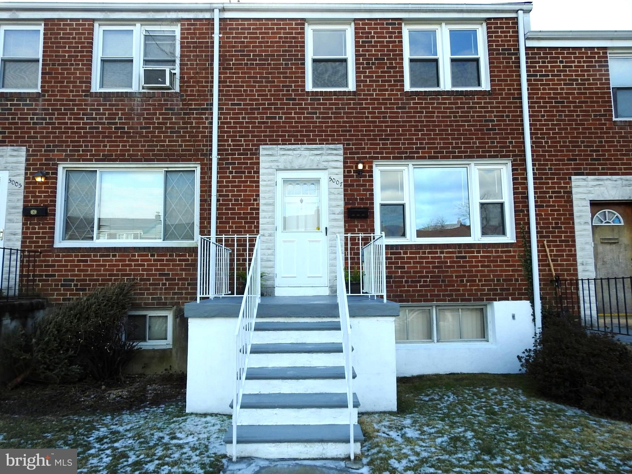 Hardwood floors, black granite counter tops and brushed nickel fixtures look beautiful together in this quality built Palladi townhouse. New stainless steel refrigerator, fresh paint throughout, new carpet, parking pad in rear. This home is in excellent condition. The family room boasts quality wood paneling with optional bar cabinet. 1/2 bath in basement finished laundry/utility room. Walk out rear exit to back yard w/parking pad. Conveniently located near 695 for easy commuter access. Near UMBC and BWI.