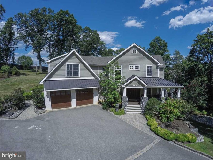 This unique, gorgeous custom built 8-year old home beautifully sited on 1.2 acres offers the best of all possible worlds. Suburban living, with big city access, small town vibe, award-winning schools, all without Philadelphia taxes.  Exceptional craftsmanship and quality construction are the hallmark. Designed by Rene Hoffman, this home has been exquisitely appointed and designed for indoor and outdoor living all year round. 4000 square feet of living space on 3 levels, this home offers an open floor plan on the main level, including a living room with a dual-sided fireplace, dining room, office/study, and spectacular state-of-the-art kitchen with over sized island, custom cabinets, granite countertops and Thermador appliances, A wet bar, powder room, and mudroom complete the main floor level.  The upper level features a master suite with double sided fireplace, endless built-ins, walk-in closet, spa-like master bath and adjacent laundry area. There are 2 additional bedrooms and a hall bath. A fully finished walk-out lower level includes an expansive living area also with fireplace and built-in bar, exercise room and full bath, second laundry room with dog bath.  The exterior is a creative blend of stonework, stucco and hardy backing featuring multiple patios, a custom salt-water pool, pavilion and pool house with a kitchen and full bath. This unique home is truly an oasis in which no expense was spared to create a spa and resort-like ambiance with every amenity provided for gracious living and entertaining.  Located just minutes from Chestnut Hill, one of Philadelphia's most venerable, sought-after destinations for shopping and dining, yet easy access to major travel routes. Luxuriously private yet conveniently located, this unique home truly has it all.