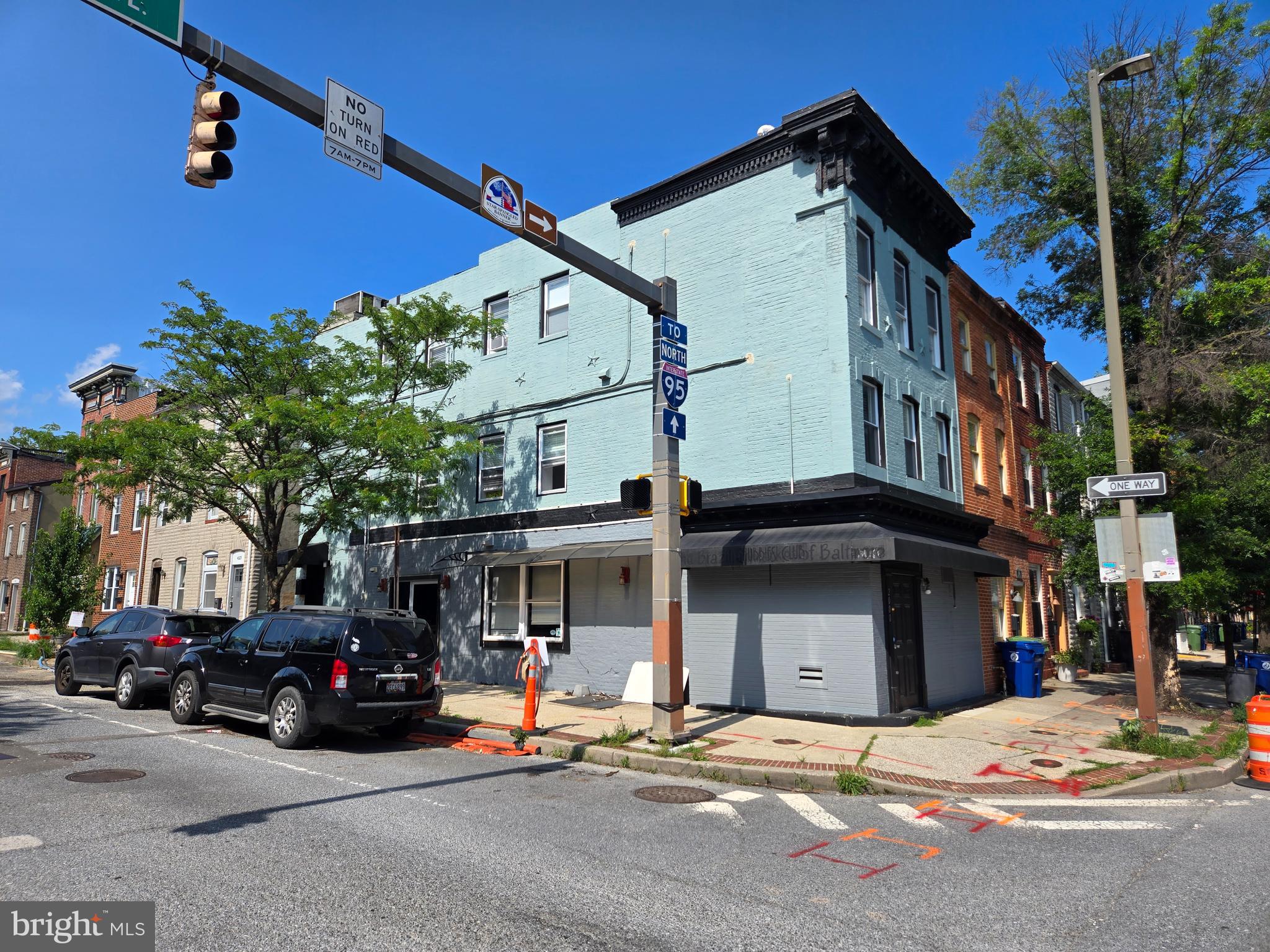 COMING SOON! Corner commercial space - Ground floor plus lower level storage in a super high visibility Fells Point location. Most recent use was a Brazilian cafe. Currently set up with bar height counters with some table space plus a kitchen prep area and two 3 part sinks. Ideally set up as a small fast casual deli/cafe/restaurant or a "grab and go" eatery or many other uses to be suggested shortly. Located just a short stroll from Historic Fells Point, Upper Fells Point as well as Patterson Park. If you're looking to establish a city presence on a heavily traveled intersection with above average visibility, come check it out!
Lease includes 4 foot hood, prep tables, beverage coolers plus 39 ft of counter. What's missing is your creative juices, above average offerings, and a little bit of hard work to begin your entrepreneurial journey!