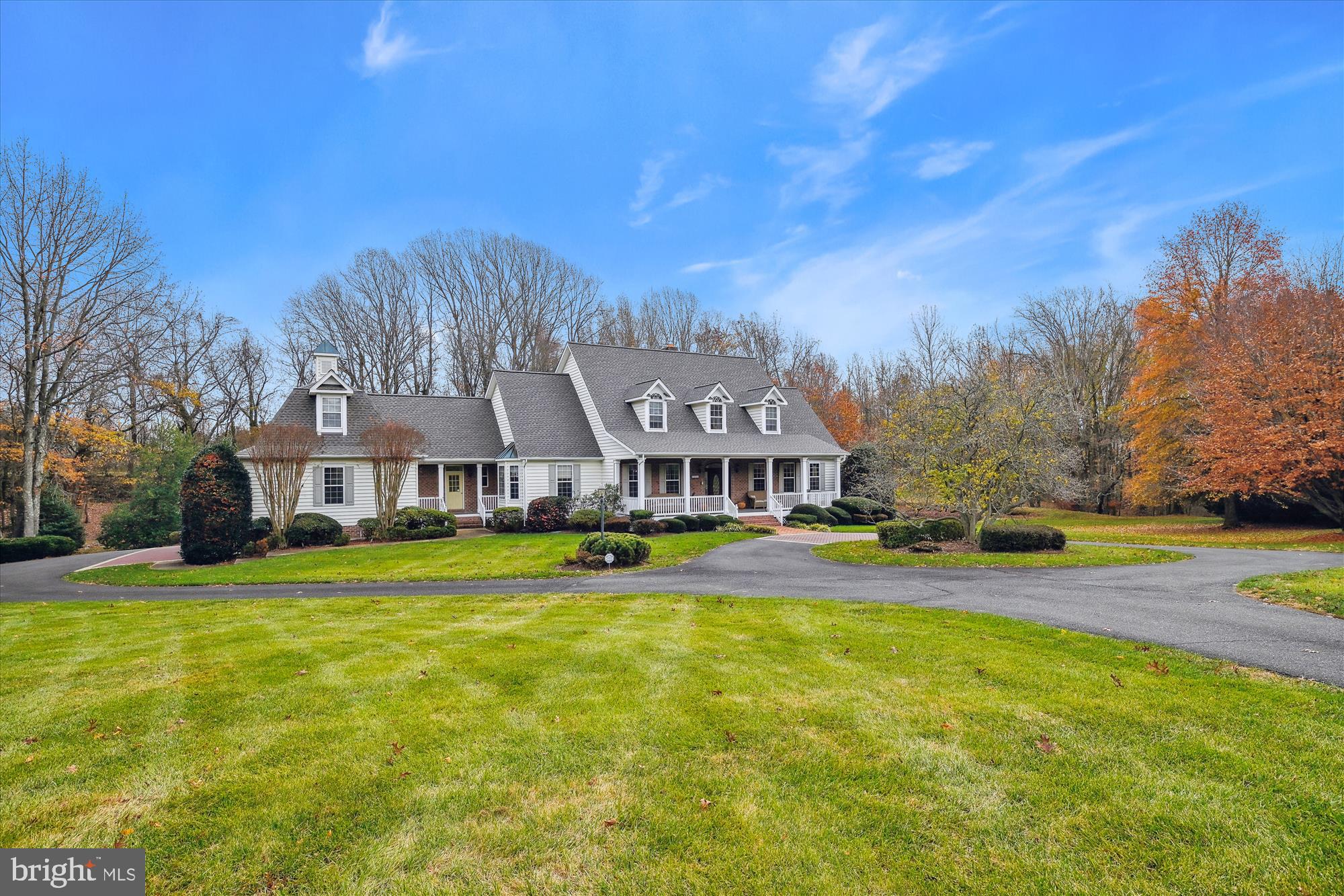 Seize the chance to own this custom-built home that was meticulously crafted for luxurious living and entertaining. Drive through this circular driveway that leads to a side 3 car garage and a rear 3 car heated garage that holds 5 cars. A grand foyer with soaring ceilings sets the stage, complemented by formal living and dining rooms. The gourmet kitchen, adjoined by a cozy breakfast room, flows into a two-story family room with propane fireplace. The primary bedroom on the main level with fireplace and two large walk in closets next to the office. Rear screened in porch opens to a deck, offering breathtaking views of the lush property. Huge open walkout basement with full bath and tons of windows with a remarkable view of the pond. Don't miss out of this 4+ acres in the heart of Davidsonville.