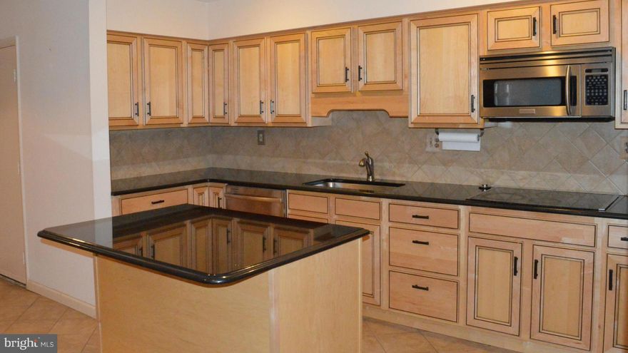 FRESHLY PAINTED & MOVE IN READY 2 Bed 2 Bath Condo. Maple Cabinets, Recessed Lights, Granite Countertops, Stainless Steel DW, Wall Oven & DW. Kitchen Island with Breakfast Bar. Washer/Dryer included! Large Living Room w/Sliders to patio. Large Master Bedroom with Walk In Closet. Conv to Highways, Shop, Rest&Public Trans. HOME WARRANTY INCLUDED! **3%** Down Payment Conv Loan for qualified buyers!