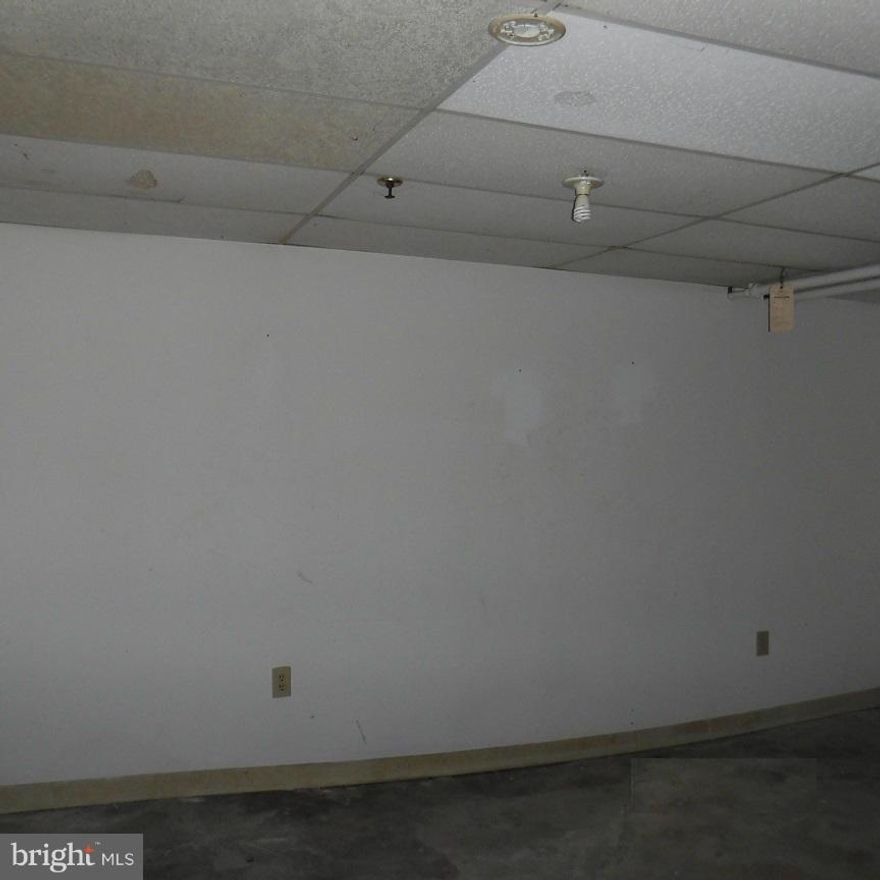 Take advantage of this awesome opportunity to own this value priced home! Enjoy spacious room sizes, full bath on each floor and fully fenced yard. Use the finished basement for added living and storage space. The covered front porch, rear deck and backyard are perfect for warm weather relaxation and entertainment. Off street parking. Convenient location; just a short drive to downtown Baltimore.