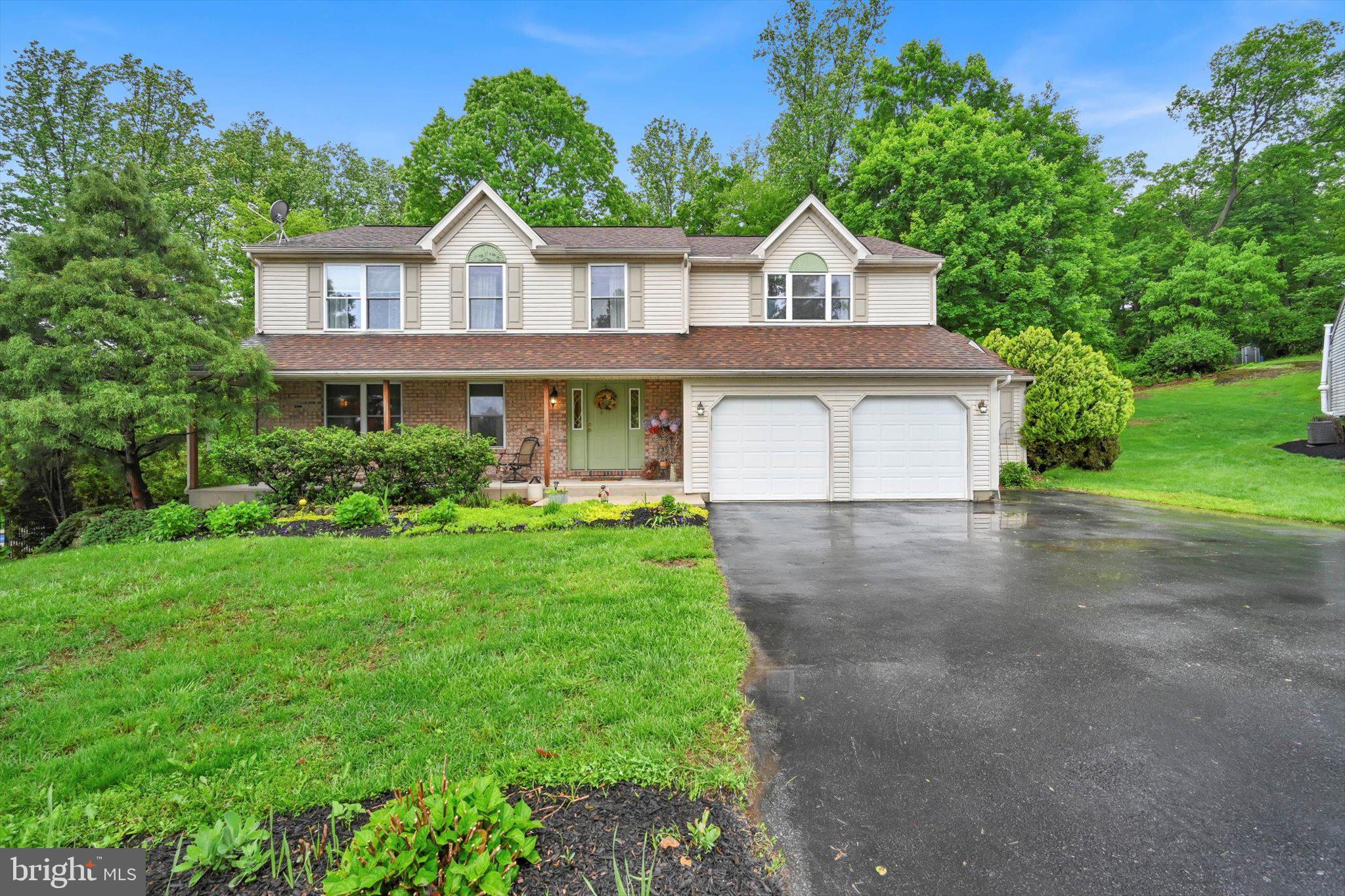 Welcome to 82 Rock Haven Ct., a beautiful 5-bedroom, 3.5+ bathroom residence situated in the award-winning Exeter Township School District. This lovely home offers a generous 3,676 sq ft of living space, including a convenient guest suite. Nestled at the end of a peaceful cul-de-sac within the Valley Ridge community, it provides a wonderful setting for comfortable living.
As you enter, the inviting living room is to your left, featuring a cozy fireplace and elegant hardwood flooring. This space flows seamlessly into the spacious dining room, perfect for hosting gatherings of all sizes. The open and airy floor plan is a highlight of this home and has been a favorite feature of the current owners.
The well-appointed kitchen is a chef's delight, boasting ample cabinetry, two pantries, stunning granite countertops, a center island with pendant lighting, and stainless-steel appliances. The main floor also features a private guest suite, complete with a bedroom, bathroom, and living area – ideal for accommodating weekend visitors or in-laws.
Upstairs, to your right, you'll find the expansive primary bedroom suite. The main bedroom is large and welcoming, featuring a dressing area that the current homeowners utilize as a home office. The en-suite bathroom offers beautiful solid-surface countertops, a separate shower, and a large jetted bathtub. Three additional well-sized bedrooms are served by the main bathroom, which was fully renovated in 2016.
The finished basement adds over 730 sq ft of versatile living space, including a separate area currently used as a craft room. The lower level also features comfortable and efficient radiant-heat flooring.
This home has been lovingly maintained by its original owner for the past 20 years, and the mechanical systems are in excellent working order. It also includes a Kinetico whole-house water purification system. For energy efficiency, the gas HVAC system and gas heater were replaced in 2012 with a digitally-zoned thermostat, and the roof was replaced in 2015.
The backyard is a private oasis, with a deck overlooking a serene forest backdrop, creating a nature-reserve feel enhanced by a flower garden and a charming stone retaining wall. A few steps down, a flagstone patio with a fire pit awaits those crisp fall evenings. The backyard is fully fenced-in and includes two sheds for storage.
With the neighborhood walking trail just steps away and convenient access to shopping, schools, and churches, this home offers a wonderful lifestyle in a welcoming community.
We encourage you to put 82 Rock Haven Ct. on your short list and schedule an appointment to see all that this exceptional home has to offer.