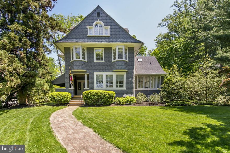 Situated on a lovely corner lot, this beautiful light-filled home offers all the charm that is so loved in a classic Roland Park home. Flowing floor plan includes fabulous family room, 4 FPs, French & pocket doors, open kitchen, original hardwoods and beautiful foyer & stairwell. 2-zone AC. Enjoy the inviting front and rear porches & level lot. Walking distance to schools, shops & restaurants.