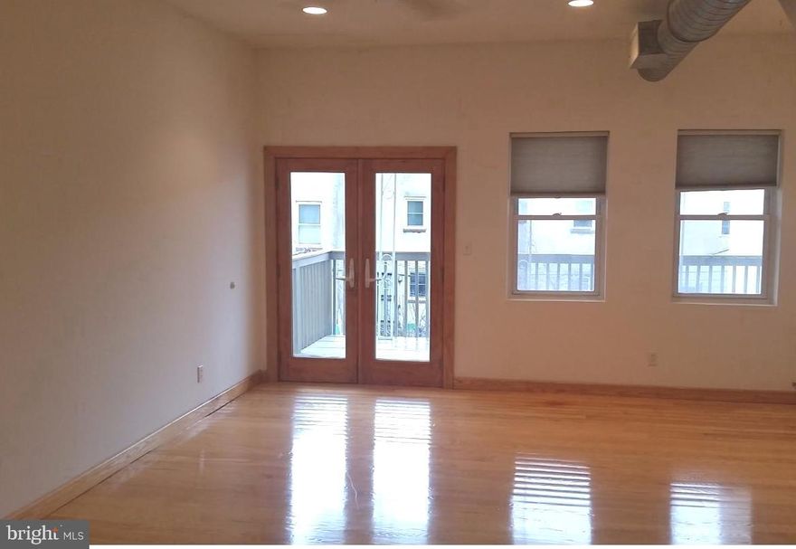 Large 2 bedroom, 1 full bath apartment in great location! Spacious open kitchen, big breakfast bar, hardwood floors throughout, central heat and air, self contained washer & dryer plus a private deck.