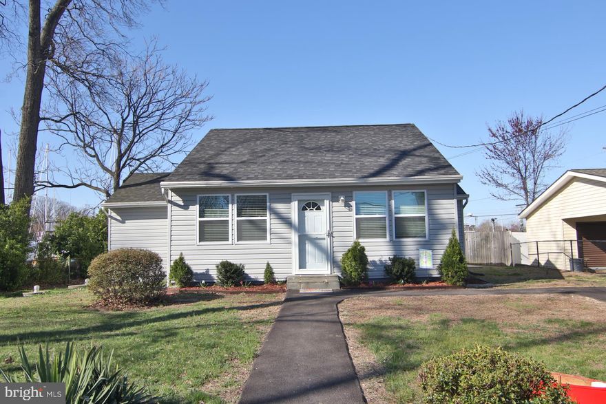 WOODLAND BEACH ROAD
ONE OF A KIND.... WATERFRONT NEIGHBORHOOD on Rock Creek has its own shared community dock with boat slips** Special assessment for waterfront property is $300 per year in the annual tax bill**  This home was totally redone inside and outside in 2018 featuring hardwood floors throughout** It has recessed lighting and quality kitchen cabinets, stainless steel appliances, granite countertops** Two totally redone full baths**Two spacious bedrooms **  New asphalt driveway installed 2022 ** Full remodel inside and outside** Patio for entertaining ** Amazing waterfront living!!