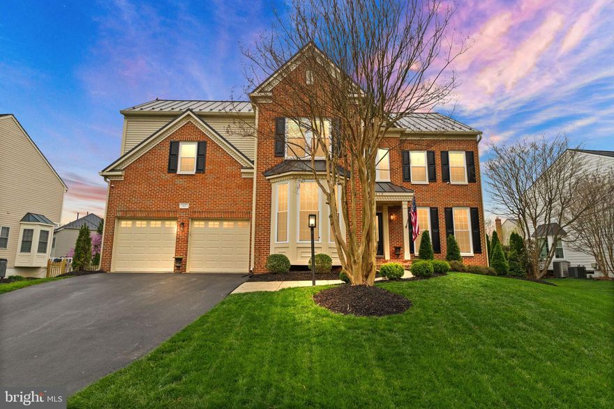 OPEN HOUSE CANCELED 

Set within the coveted community of Woodlea Manor, this 4-bedroom, 4.5-bathroom home is part sophistication, part warmth.

Step inside to a gracefully flowing interior, where a soaring two-story foyer sets the stage. Wide-plank luxury vinyl flooring sweeps through the main level, guiding you effortlessly through elegant spaces and into the heart of the home — a chef’s kitchen, artfully appointed with stainless steel appliances, refinished cabinetry, granite counters and a center island. Open to the kitchen, a vaulted ceiling crowns the inviting family room, where a stacked-stone wood-burning fireplace anchors the space in warmth and style. Newer double-pane and bay windows bathe the living spaces in natural light while framing picturesque views. Also on this level is a home office with stately built-in shelving, a living room, a dining room, and a powder room. The attached 2-car garage is accessed from this level.

Step out onto the recently added Trex deck with stairs down to a patio and a fully fenced back yard with lush grass framed by beautiful plantings. What a perfect setting for your backyard BBQs or intimate al fresco dining.

Back inside, ascend the wood stairs to yet another level of this home covered in LVP flooring. You will find four well-appointed bedrooms off the gracious landing. There are three full bathrooms on this level-- an appealing feature in this neighborhood (as many of the upper levels only offer 2 bathrooms). Behind double French doors, the large primary suite is a sanctuary unto itself, boasting bespoke closets, built ins, and a spa-inspired bath featuring dual vanities, a Roman rainshower, and a deep soaking tub for ultimate relaxation. For your convenience, just down the hall is the laundry room.

The lower level offers expansive flexibility, featuring a rec room with a fireplace, a spacious home theater area, a den/exercise or hobby room, a full bathroom, and a storage room. There is a walk-up staircase exit to the backyard, further enhancing the flow of this layout.

Updates include: newly rebuilt front steps (2025), new siding (2024), new primary bathroom (2024), new runner on staircase (2024), new LVP flooring in lower level (now on all three levels of the home!), Trex deck & patio (2022), HVAC systems (2020/2022), water heater (2020), metal roof (approximately 2020), newer windows, custom blinds, irrigation system, refinished kitchen cabinets and newer appliances, newer fence, recess lights on main and upper levels.

Residing in Woodlea Manor means more than just exquisite real estate — it’s a lifestyle. Enjoy access to plentiful amenities: a sparkling pool, clubhouse, sports courts, tot lots, and miles of scenic trails. Just moments from vibrant Historic Downtown Leesburg, indulge in boutique shopping, fine dining, and year-round events — all while remaining seamlessly connected via Routes 7 and 50, the Dulles Greenway, and the Silver Line Metro.

Here is a rare opportunity to own an impeccably curated home in one of Northern Virginia’s most desirable communities — seize this exceptional offering before it's gone.