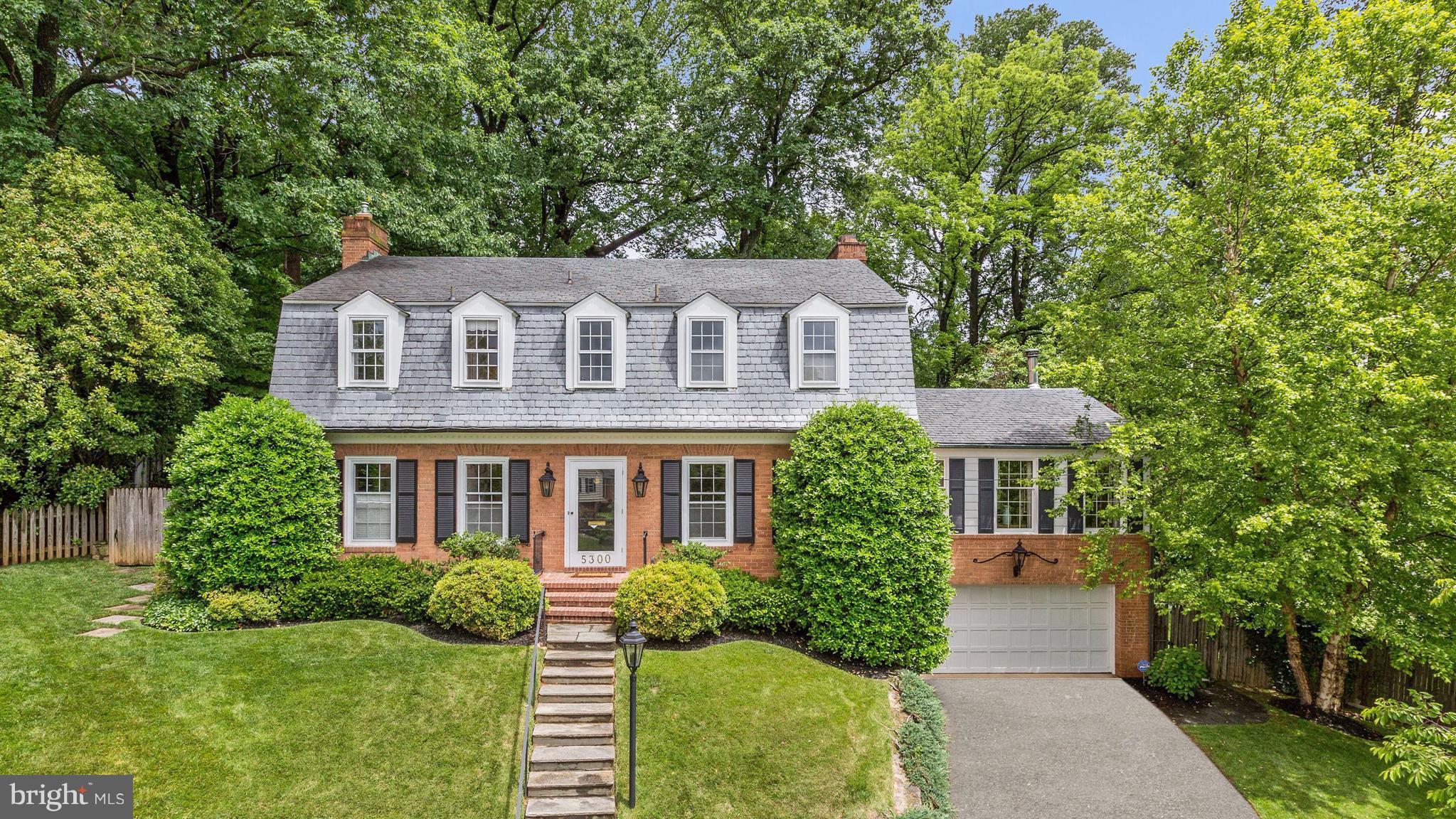 Opportunity to purchase a charming home, a stone throw from walking path to downtown Bethesda.Unexpected,magnificent deep backyard;covered deck +terrace.Generous rooms,Renovated Kitchen w/ ButlersPantry,elegant Living+ Dining Rm, Sunroom/Breakfast Rm. w/ walls of windows, Family Room addition, Exit doors from every room on main floor to fabulous tranquil surrounding + total privacy!