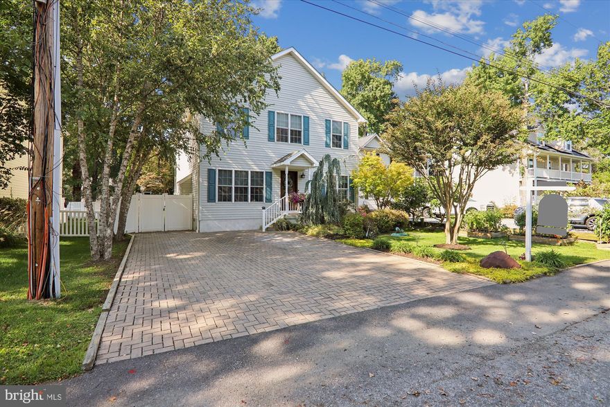 Just reduced! Beautifully renovated and move-in ready, this 4-bedroom, 2.5-bath home showcases an airy open floor plan featuring a new gourmet kitchen equipped  with  GE Cafe custom smart appliances including a gas stove - perfect for the home chef who appreciates both style & technology. All  new baths, a modern custom staircase, new carpet throughout the upstairs level, new HVAC (2024) and a new water softener (2020), lawn irrigation system. Enjoy cozy evenings by the gas fireplace or relax in the light-filled three-season sunroom, which overlooks the gorgeously landscaped, fully fenced backyard complete with a firepit and storage shed. The huge primary suite offers a spa-style bath and generous closets, while custom blinds and tasteful finishes add comfort and style. From multiple rooms you’ll enjoy serene water views framed between neighboring homes, a daily reminder of the coastal setting.

Just a short stroll away, North Selby & Selby-on-the-Bay's private waterfront amenities on Selby Bay invite you to live the Chesapeake lifestyle—sandy beach, protected swim area, beach-front clubhouse, playground, basketball/pickleball court, and kayak/canoe racks. Keep your boat at the Selby Bay Marina within the community and explore the South River and the open Chesapeake Bay at your leisure.

This home blends modern updates with the charm of a sought-after water-privileged neighborhood—the perfect combination of stylish living and year-round recreation.