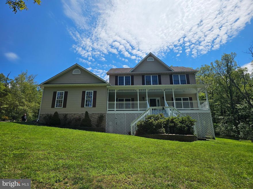 Spacious home located on private wooded lot. Enjoy the views from the front porch and back gazebo. Kitchen overlooks living area with propane fireplace. Primary bedroom features vaulted ceilings, oversized closet and updated private bathroom with large soaking tub.

Unfinished basement offers plenty of storage space. Dogs considered case by case, no cats