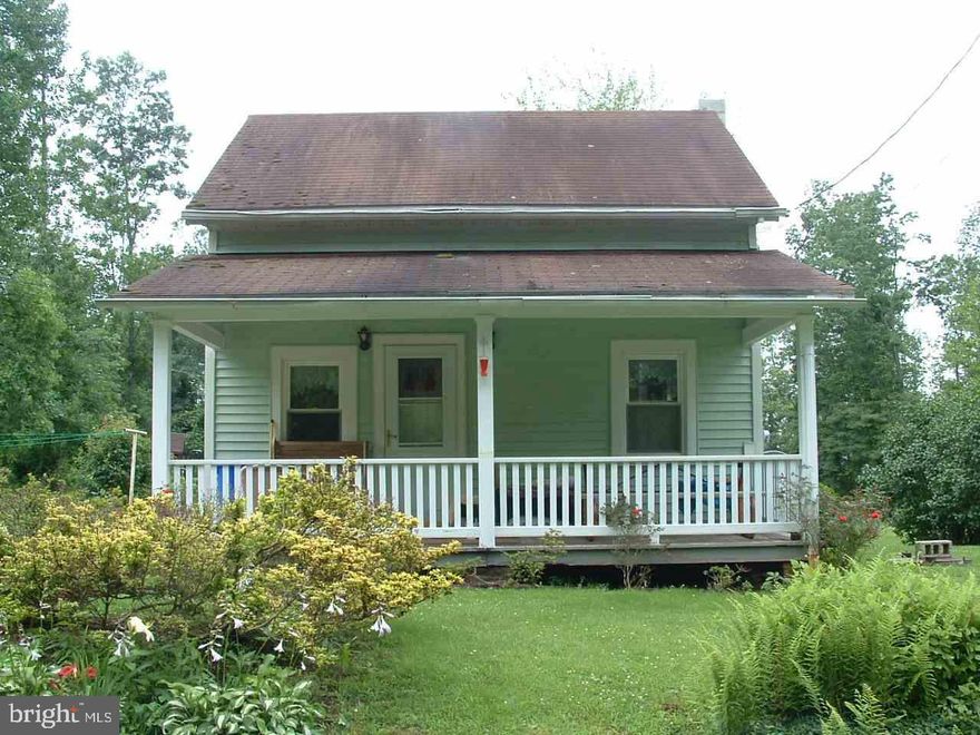 Make this your country dream.  Great location 2 bedroom house.  Home is solid but does need some remodeling.  Very nice 5.5 acres of land.  2 car garage.  Potential to be something special.