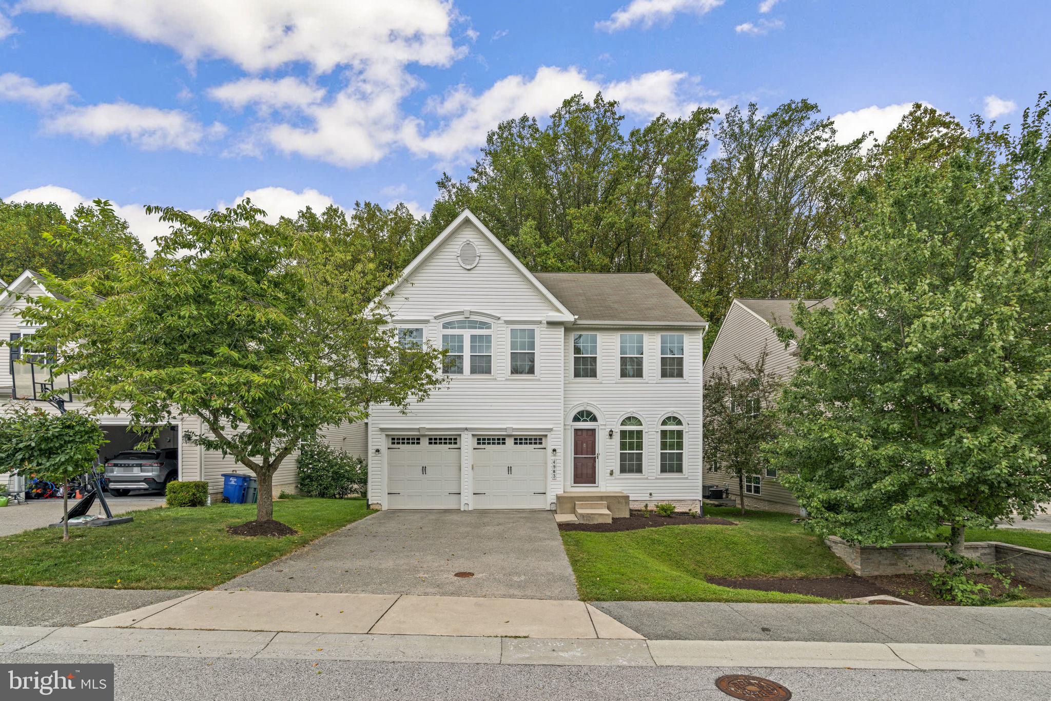 Practically new 2-car garage colonial on a premium level lot backing to forest conservation in Locust Chapel, Howard County’s first green neighborhood. Endless upgrades w/over 4,300 sq ft of space: dual-zone gas HVAC w/Ecobee thermostats; tall 9’ ceilings; neutral paint decor and brand new carpeting (2025); gourmet eat-in kitchen features 42″ maple cabinets w/glass display cabinets, granite, center island, ceramic tile floor, GE Profile appliances, double wall oven, gas cooktop w/Broan range hood & French door refrigerator w/water and ice-maker; kitchen opens to the bright family room; separate dining room w/bay window bumpout; French doors lead to the 1st floor office; separate living room and powder room round out the 1st floor; upper level offers 4 bedrooms, 3 full bathrooms all w/granite vanities, and a laundry room w/front-loading washer and dryer, utility sink & linen closet; primary suite w/walk-in closet, ceiling fan & spa like bath w/dual vanities, soaking tub, shower, water closet & linen closet; 4th bedroom includes a private en suite full bathroom; expansive lower level w/endless future finishing possibilities with an egress window for a lower level bedroom. Energy-certified community w/solar pavilion, garden area, open space and sidewalks. Prime commuter location to Rt 100, I-95, Baltimore, DC, NSA and BWI Airport and commuter rails. Zoned for premier Howard County schools!