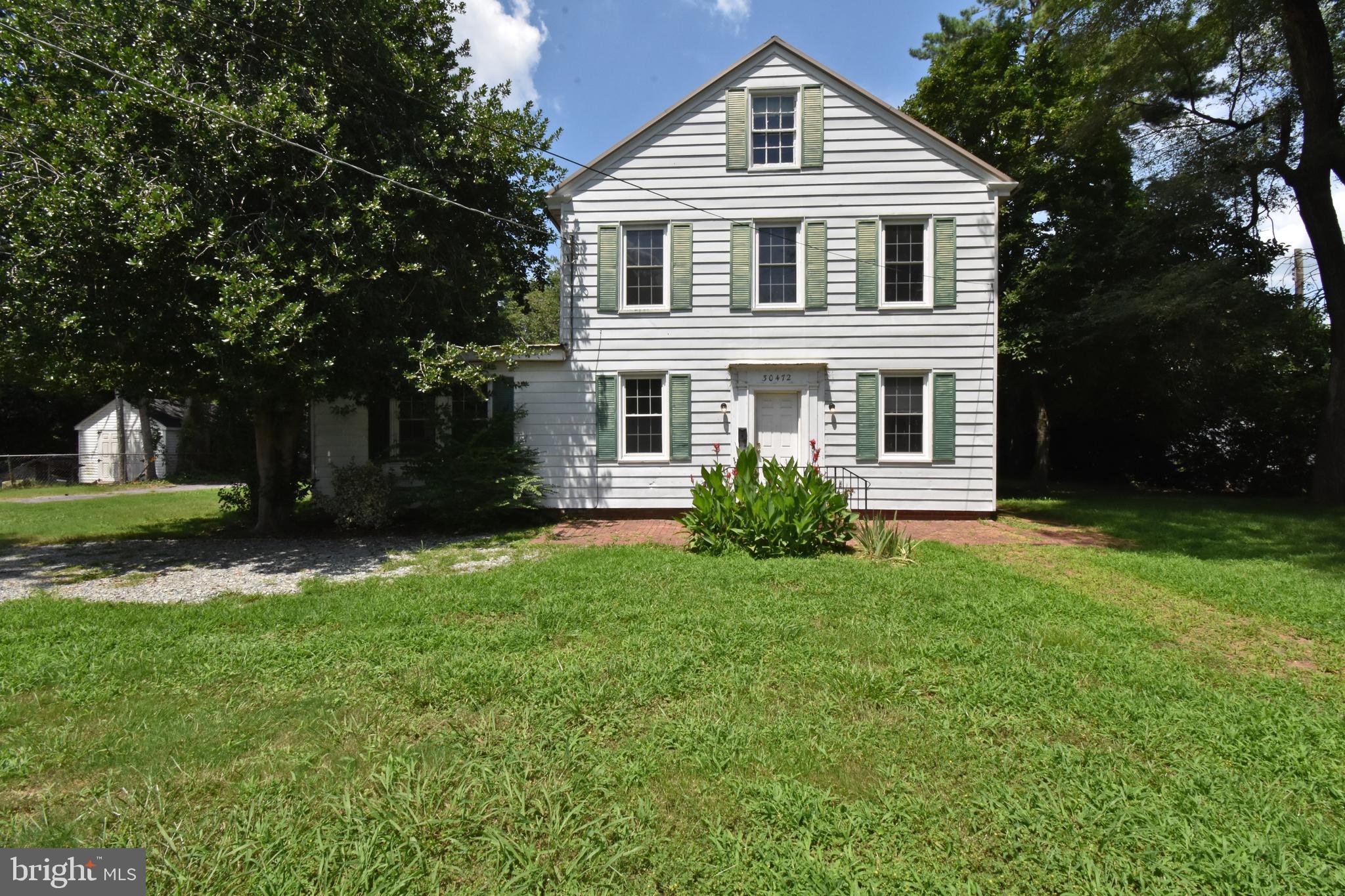 Discover the potential at 30472 Broad St in the heart of Princess Anne. This spacious 4-bedroom, 2-bathroom home offers 2,648 square feet of living space, with a flexible layout that includes one bedroom and full bath on the main level, and three additional bedrooms and a second full bath upstairs—ideal for multi-generational living or guest privacy. The property features a large one-car garage with a durable concrete floor, perfect for storage, a workshop, or future updates. While the home needs some TLC, it presents a fantastic opportunity to bring your vision to life in a generously sized home with solid bones. As a bonus, this sale includes an additional parcel across the street—30461 Broad St, Princess Anne, MD 21853 (Tax ID: 2001008277)—offering even more space and possibilities, whether for added privacy, expansion, or investment. Don’t miss your chance to create something special. Whether you're looking for a personal project or a savvy investment, 30472 Broad St is full of potential. Schedule your showing today!