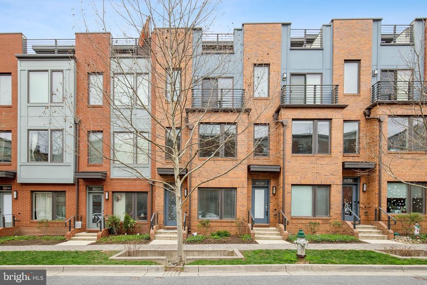 Looking for a home that checks all the boxes—location, comfort, and value? This beautifully maintained townhome is tucked away from the main road for extra peace and quiet, yet just a short walk to the Metro. It's the perfect spot for home buyers looking for long-term potential.

Enjoy sunset views from your private rooftop deck, and take full advantage of the community clubhouse, gym, co-working space, and swimming pool—all just steps from your door. This mixed-use, master-planned neighborhood is already thriving and only getting better, with shops, restaurants, and development all around.

Inside, you’ll find 4 bedrooms, 3.5 bathrooms, and a bright, open layout that feels welcoming and functional. The owner chose top-notch builder upgrades like modern kitchen cabinets, upgraded countertops, stylish flooring, and an enlarged main-level deck. There’s also a top-floor bedroom with a private bath and another on the entry level—perfect for guests or flexible living. The oversized garage gives you even more space for storage or hobbies.

This is a smart buy in a fast-growing, high-potential area—don’t miss your chance to get in early and enjoy both the convenience and future upside.